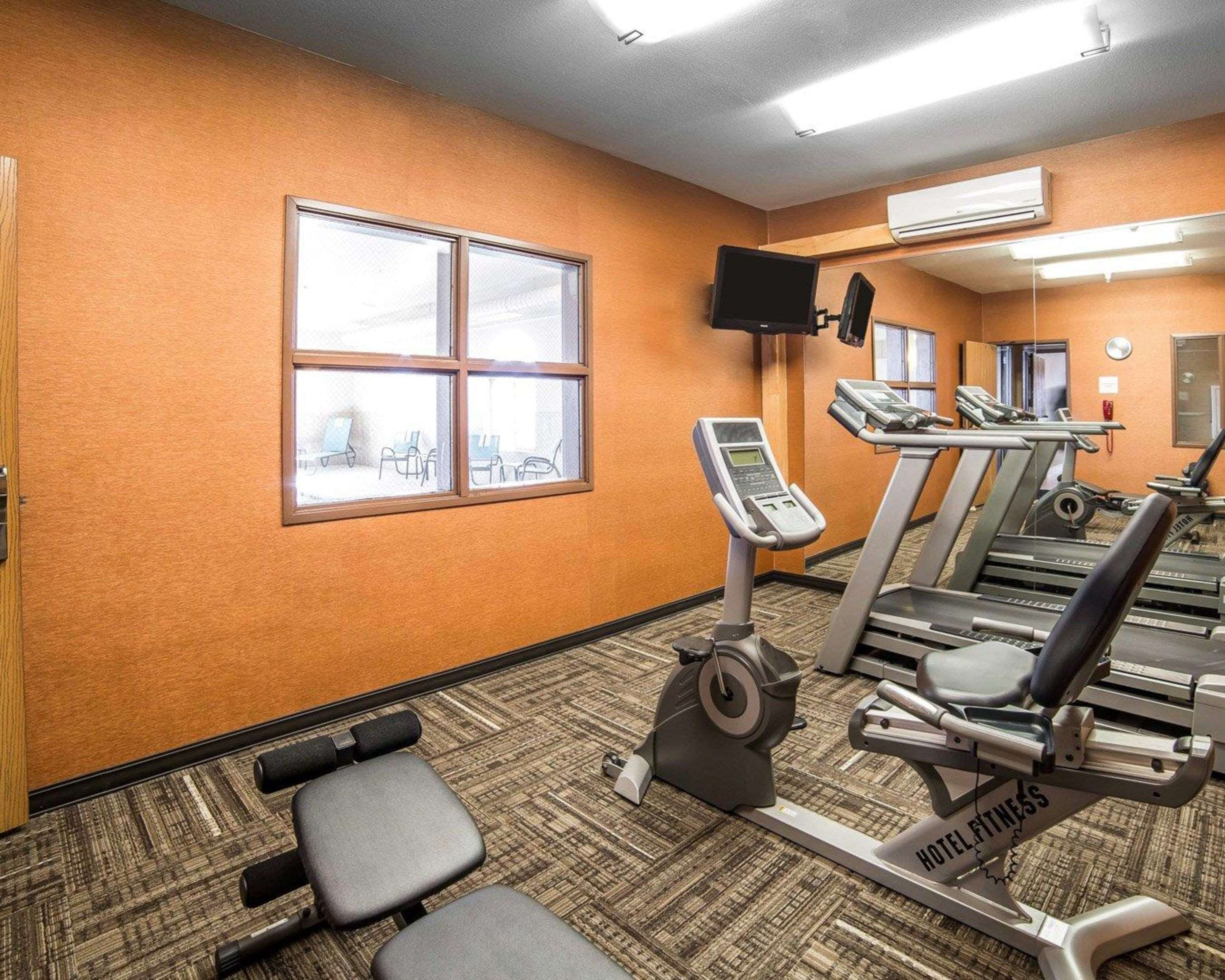 Fitness center with cardio equipment and weights