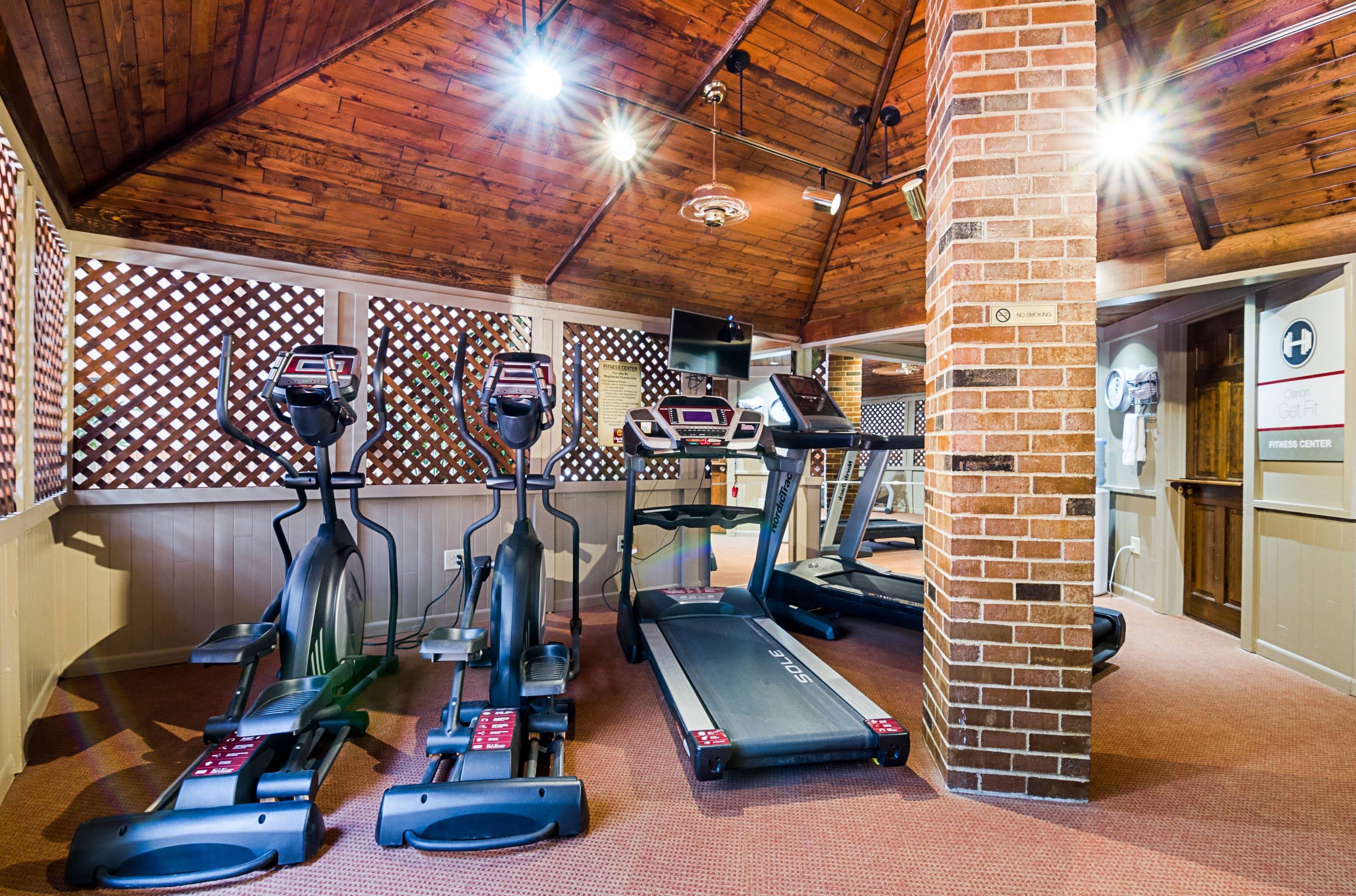 Exercise room with cardio equipment | Clarion Inn