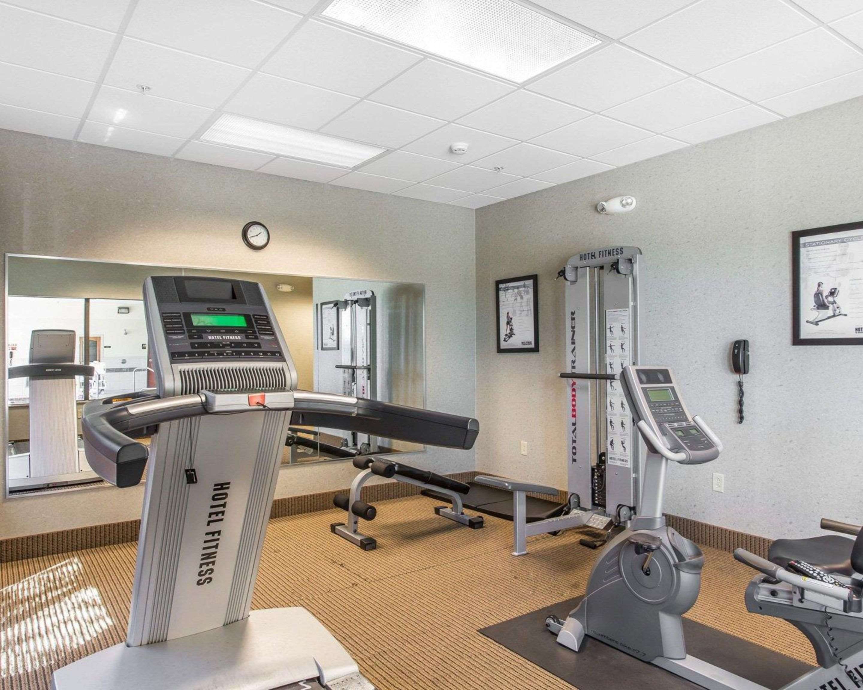 Exercise room with cardio equipment and weights | Comfort Inn And Suites