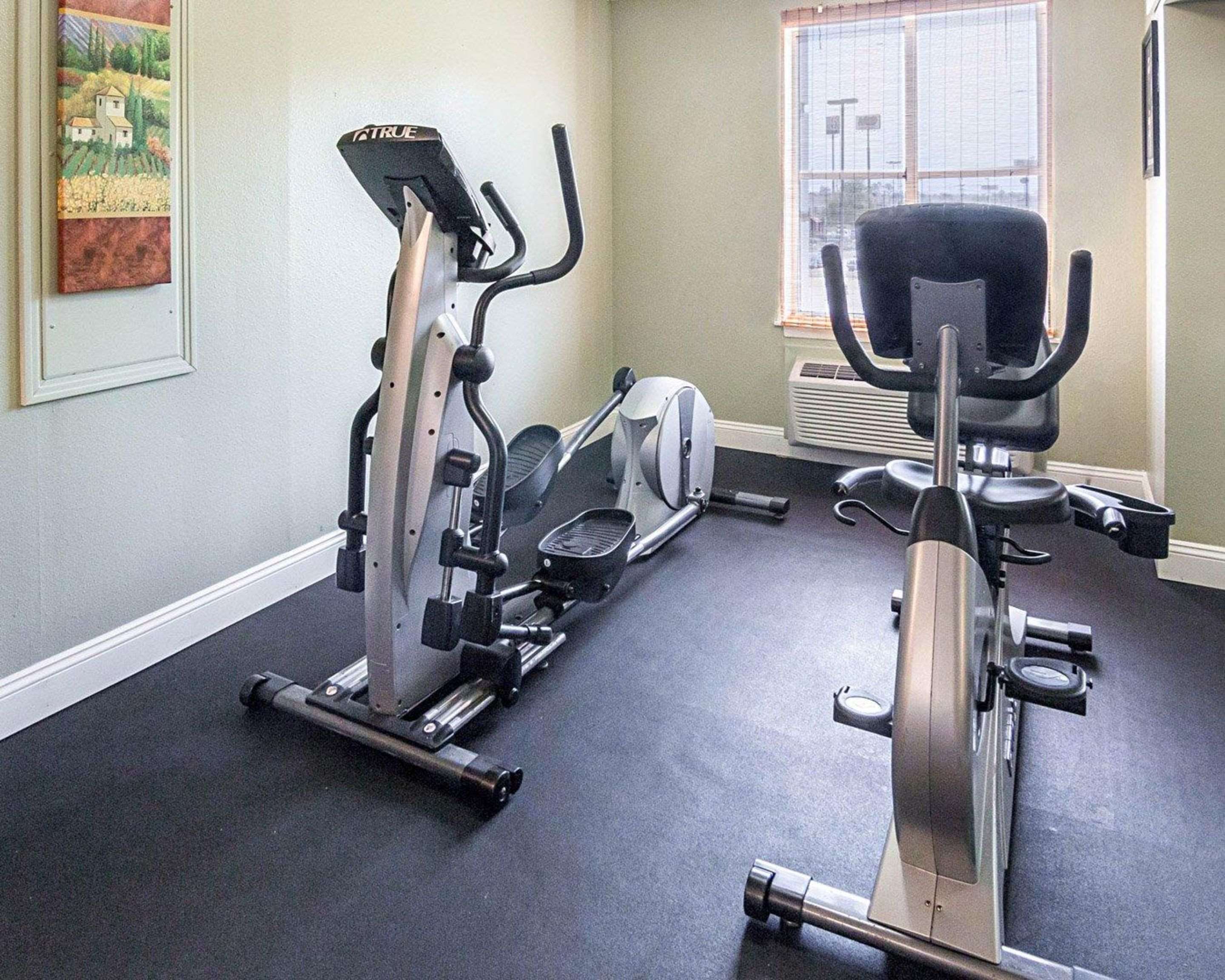 Fitness center with cardio equipment | Quality Inn And Suites