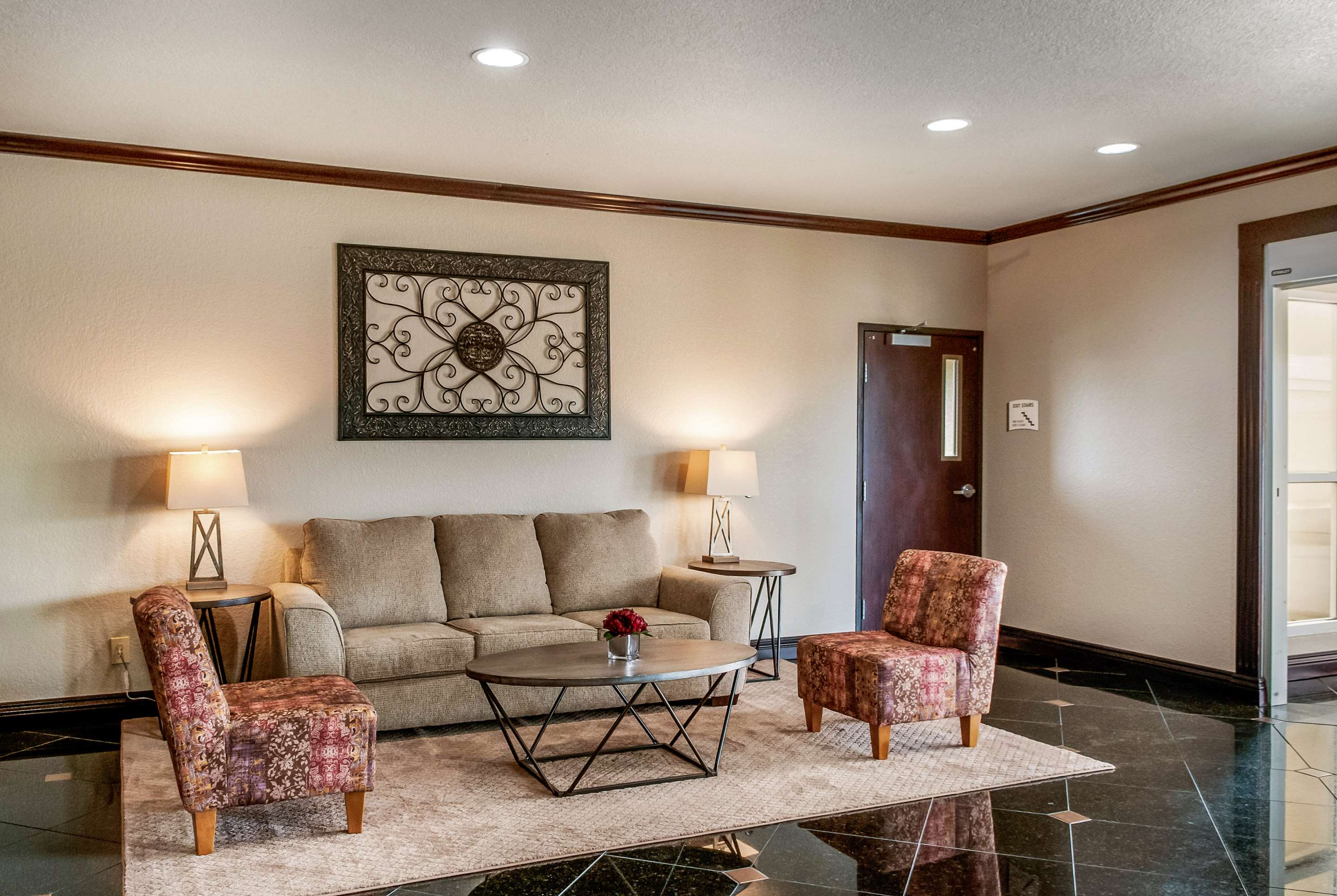 Lobby with sitting area | Quality Inn & Suites Slidell