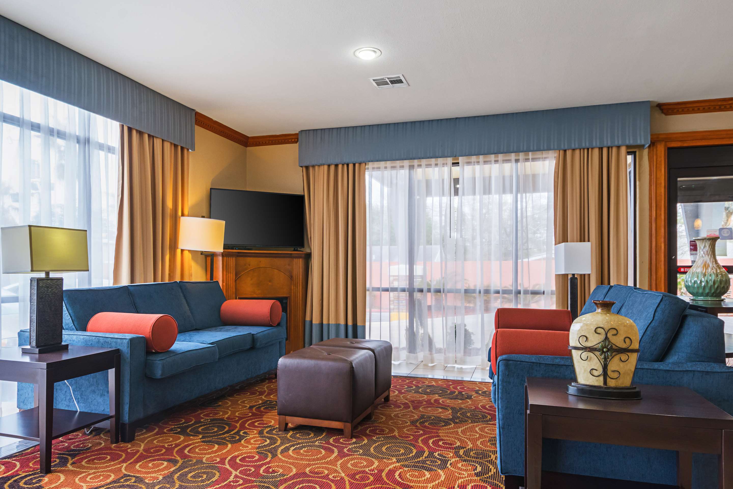 Spacious lobby with sitting area | Comfort Suites Lake Charles