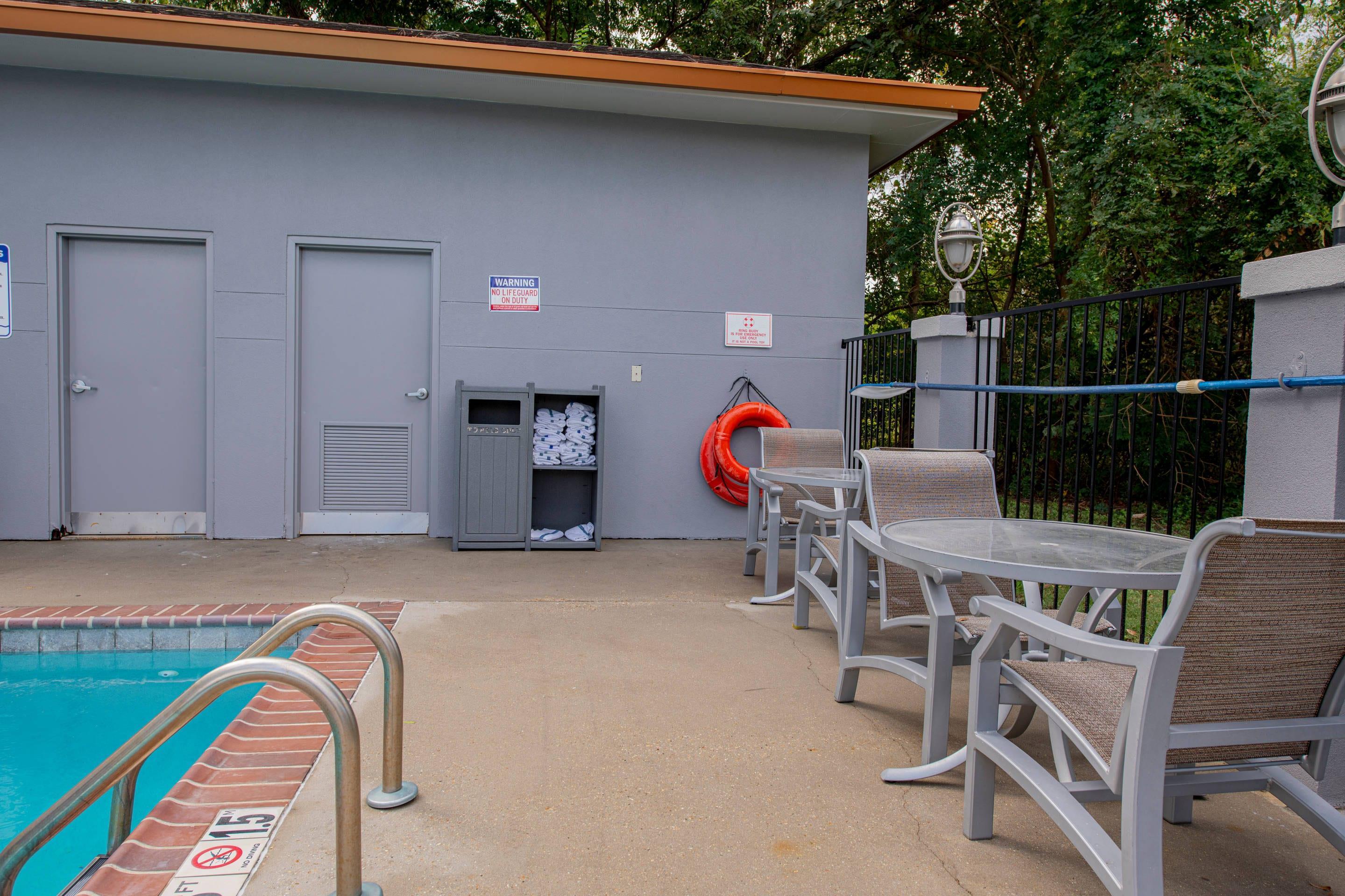Pool seating area | Comfort Suites Oil Center