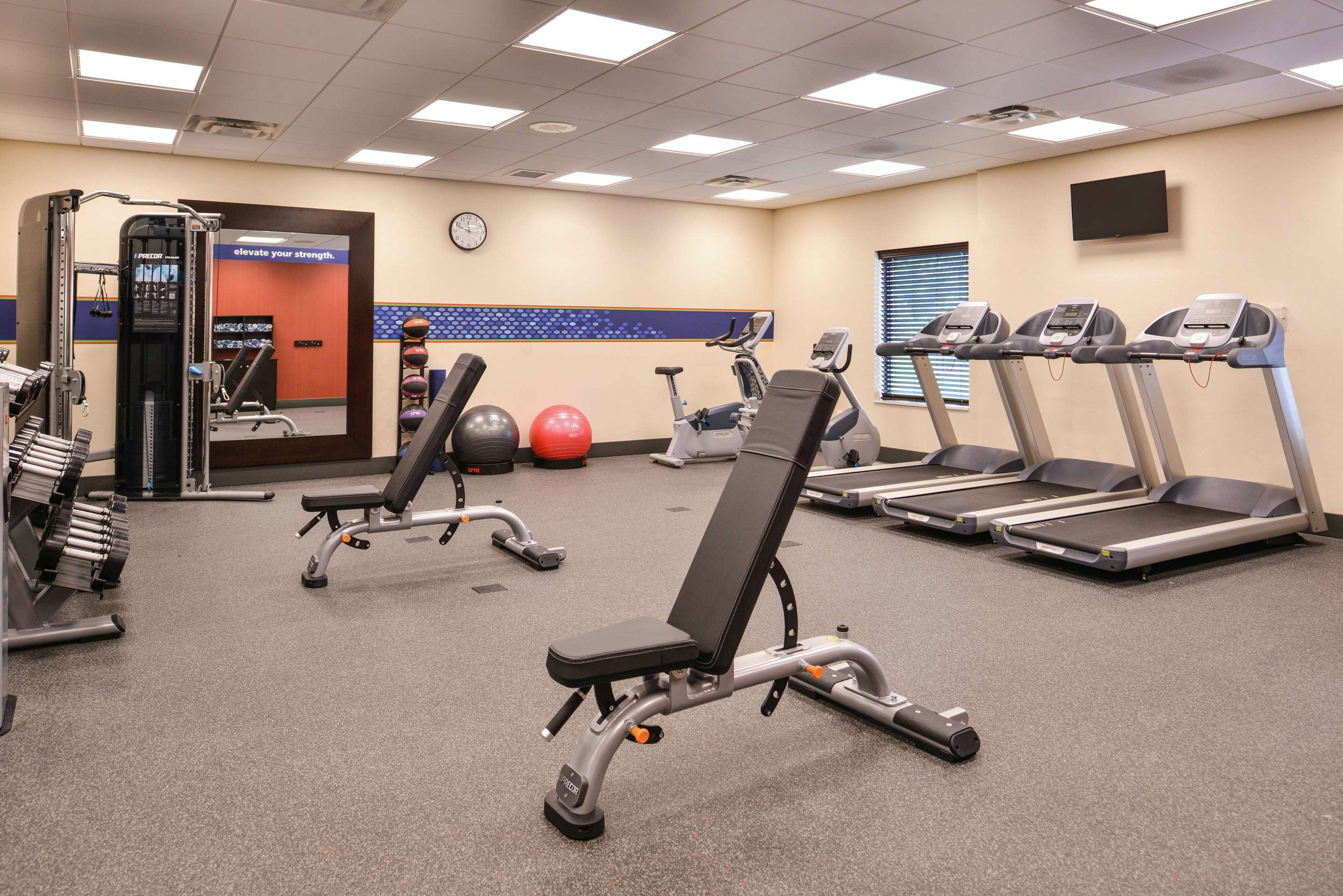 Health club fitness center gym | Hampton Inn & Suites St. Paul Oakdale/Woodbury