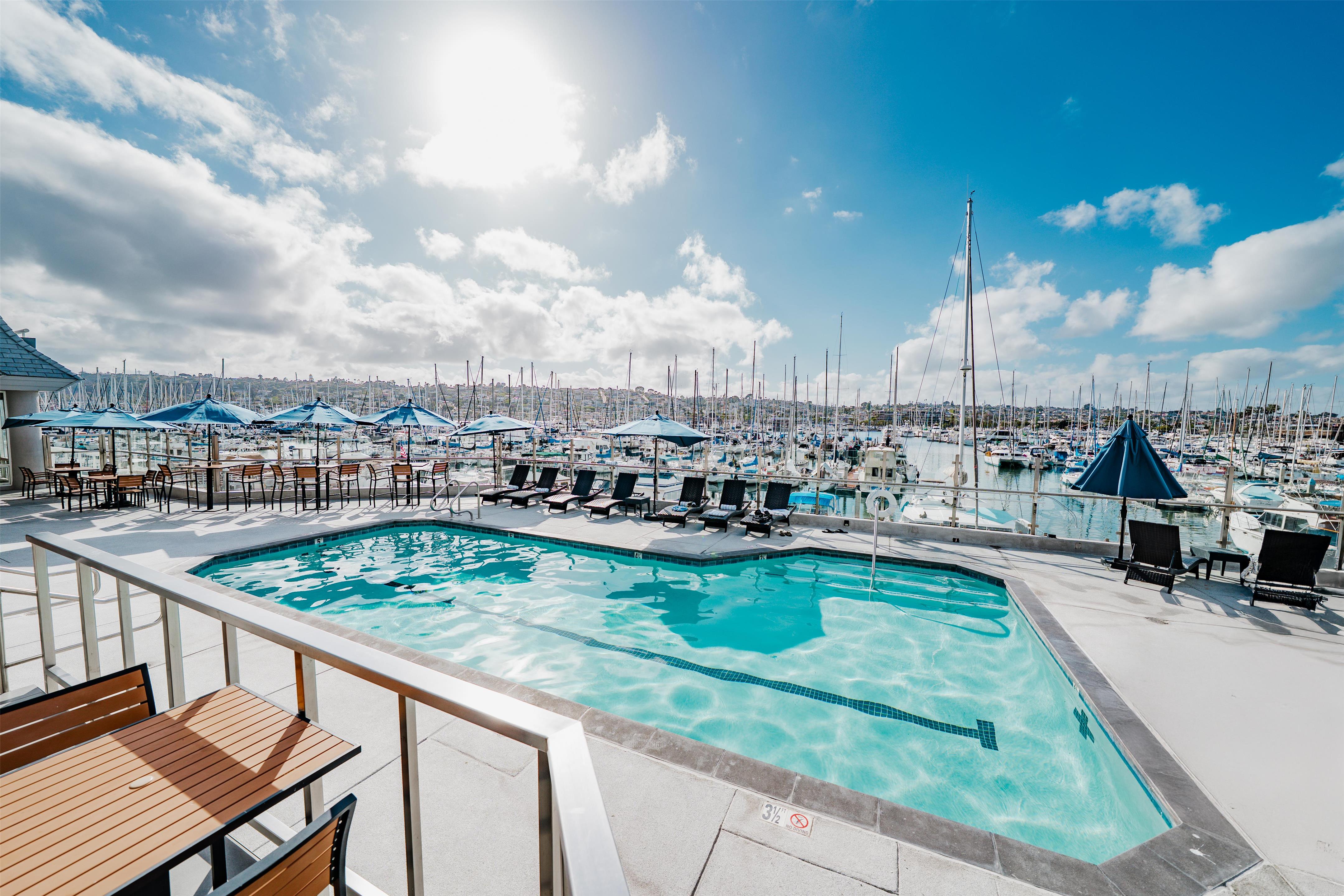 Patio and Pool Overlooking the Marina | Bay Club Hotel & Marina
