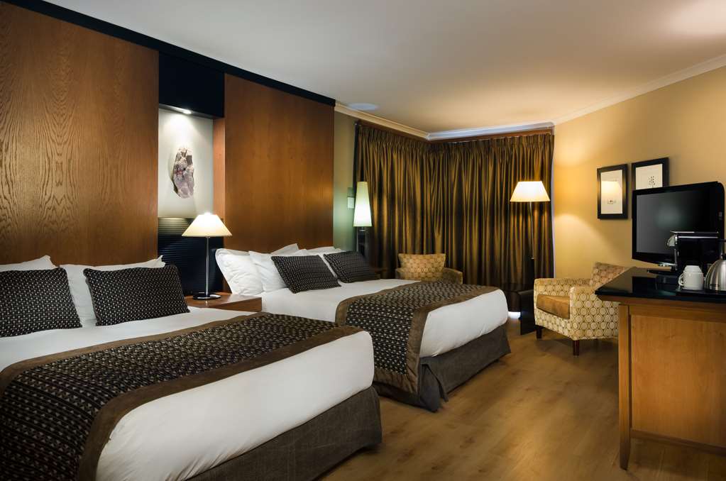 The Oasis-guestroom-Guest Room,On-Site.jpg