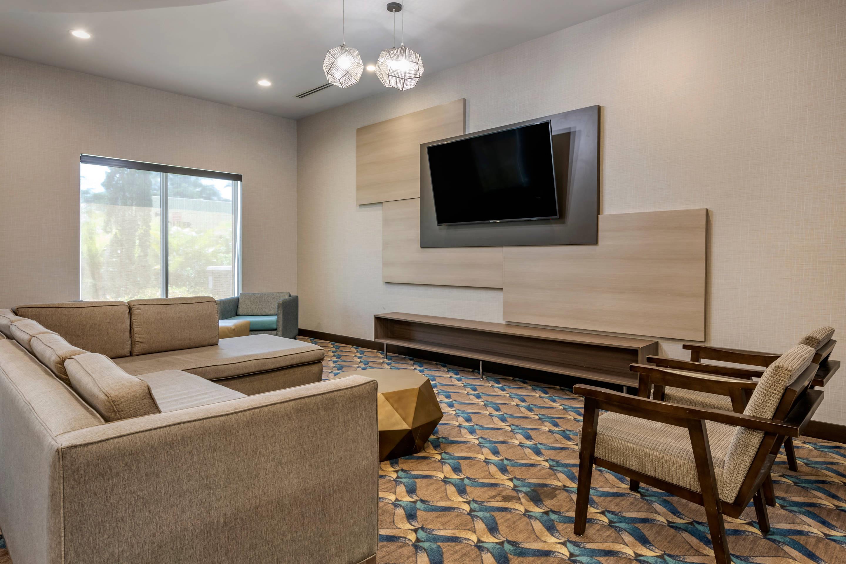 Spacious lobby with sitting area | Comfort Suites Fort Lauderdale Airport & Cruise Port