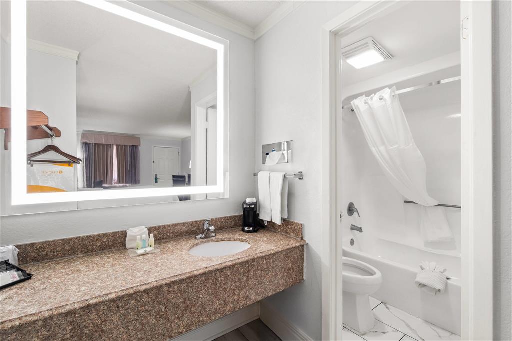 QUALITY INN FORREST CITY I-40-guestroom-Guest Room,Bathroom,On-Site.jpg