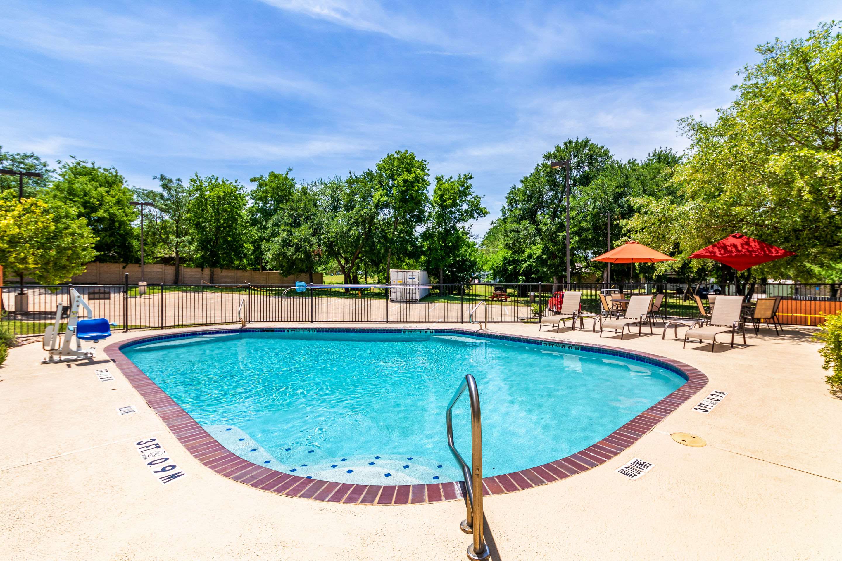 Outdoor pool | Quality Inn & Suites
