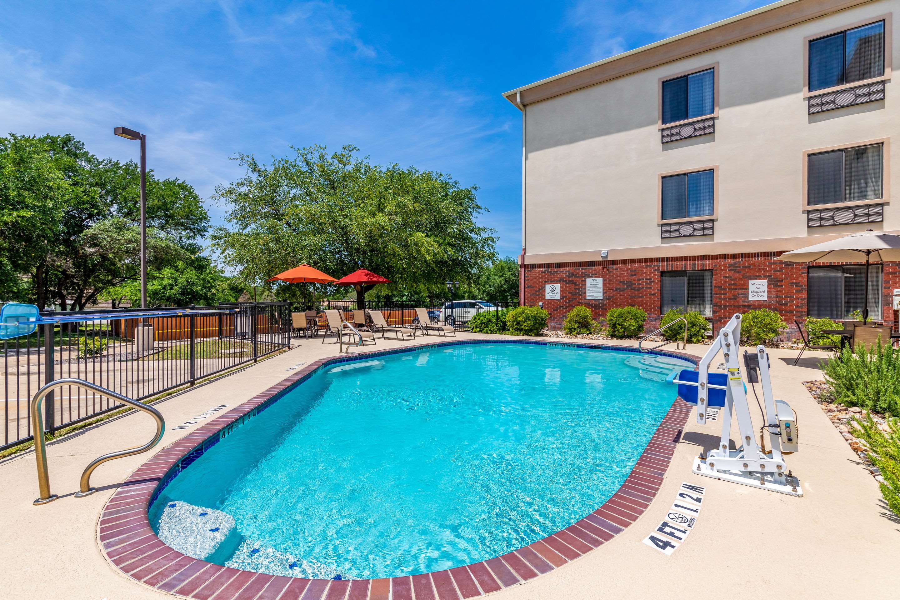 Outdoor pool | Quality Inn & Suites