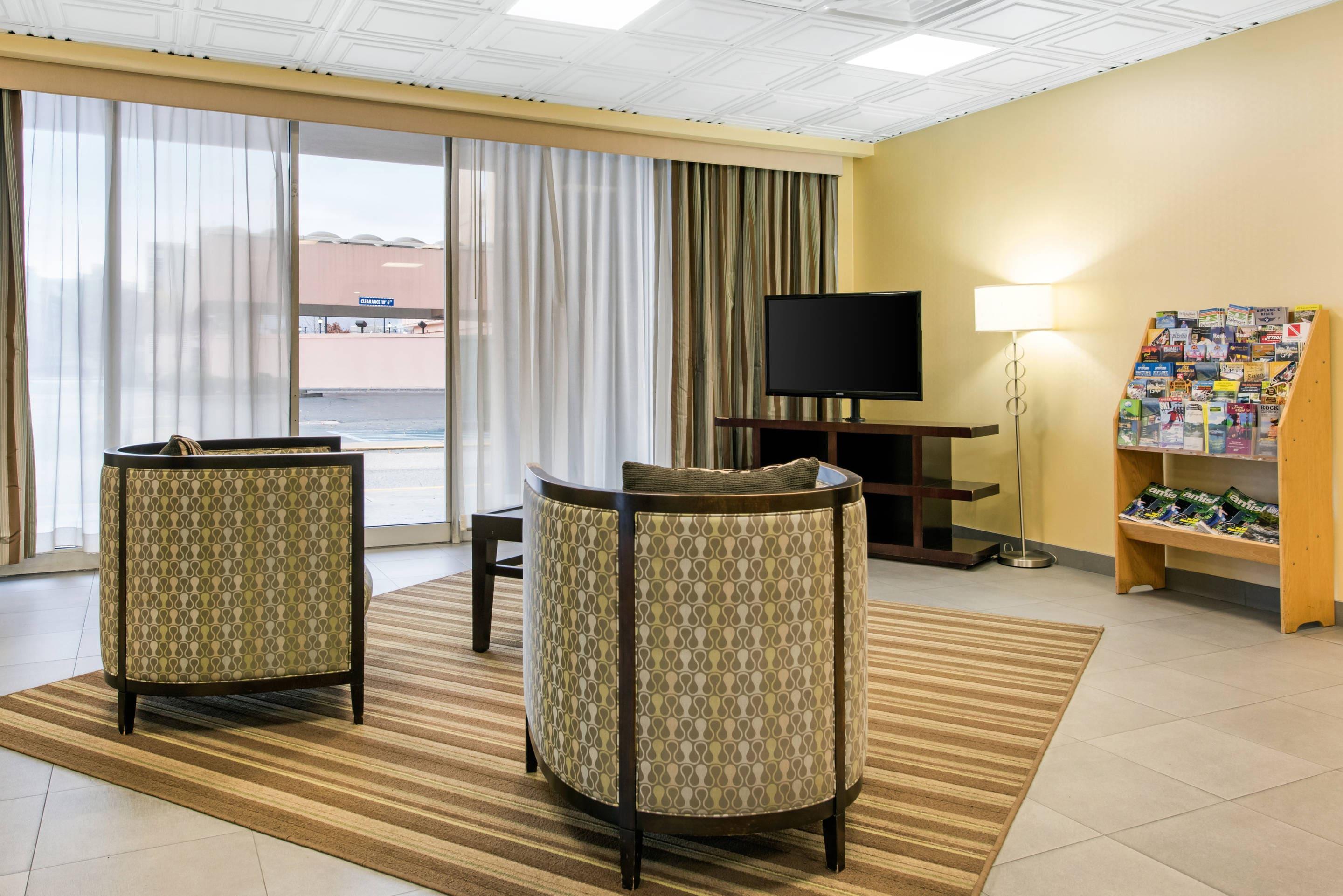 Lobby with sitting area | Quality Inn & Suites