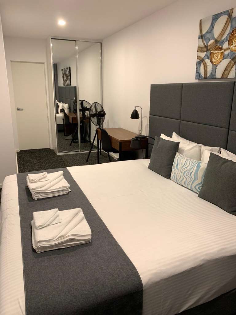THE PALMS APARTMENTS-guestroom-Guest Room,On-Site.jpg