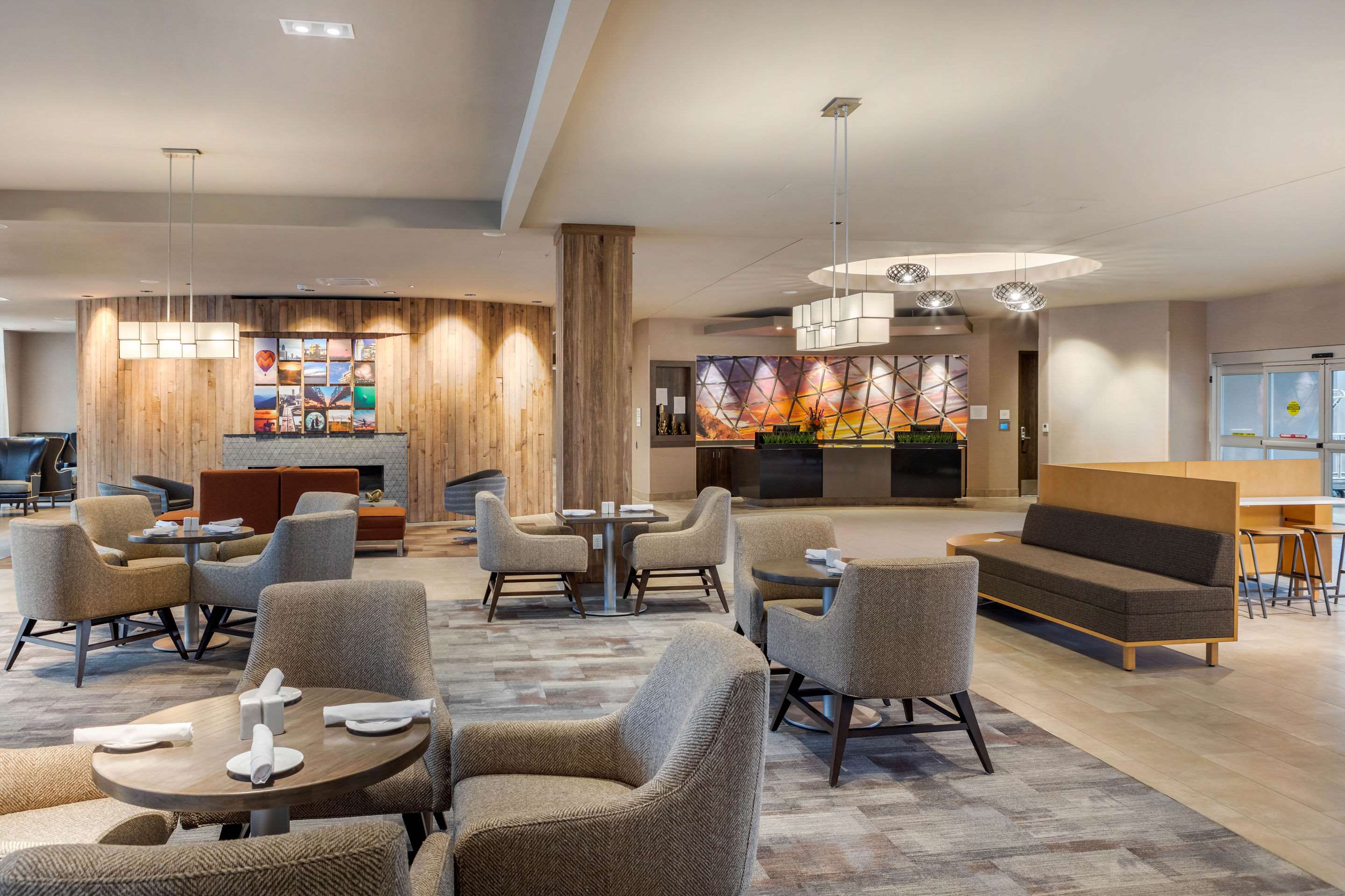 Lobby with sitting area | Cambria Hotel Omaha Downtown