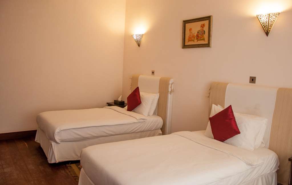 ZZ-TERM-SUN AFRICA BEACH RESOR-guestroom-Guest Room,On-Site.jpg