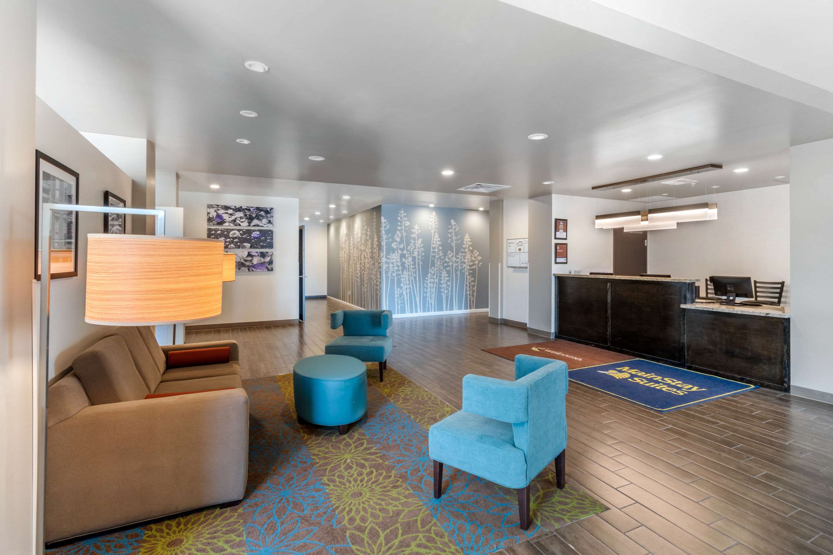 Spacious lobby with sitting area | MainStay Suites Denver International Airport