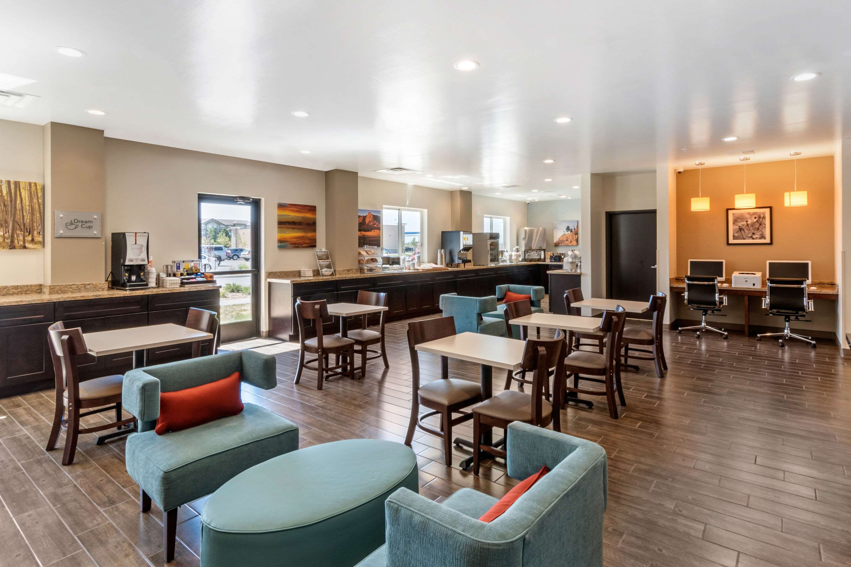 Enjoy breakfast in this seating area | MainStay Suites Denver International Airport