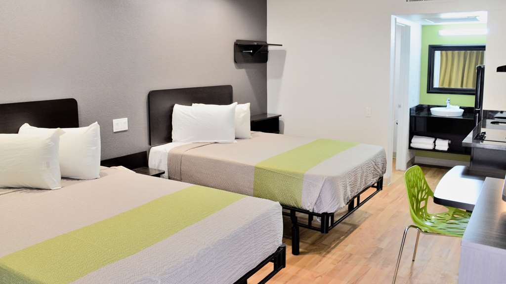 STUDIO 6 BUTTONWILLOW, CA-guestroom-Guest Room,Sink,Bedding,Guest Room Amenity,Sitting area,On-Site,Furnishings,Double Room,Standard Room.jpg