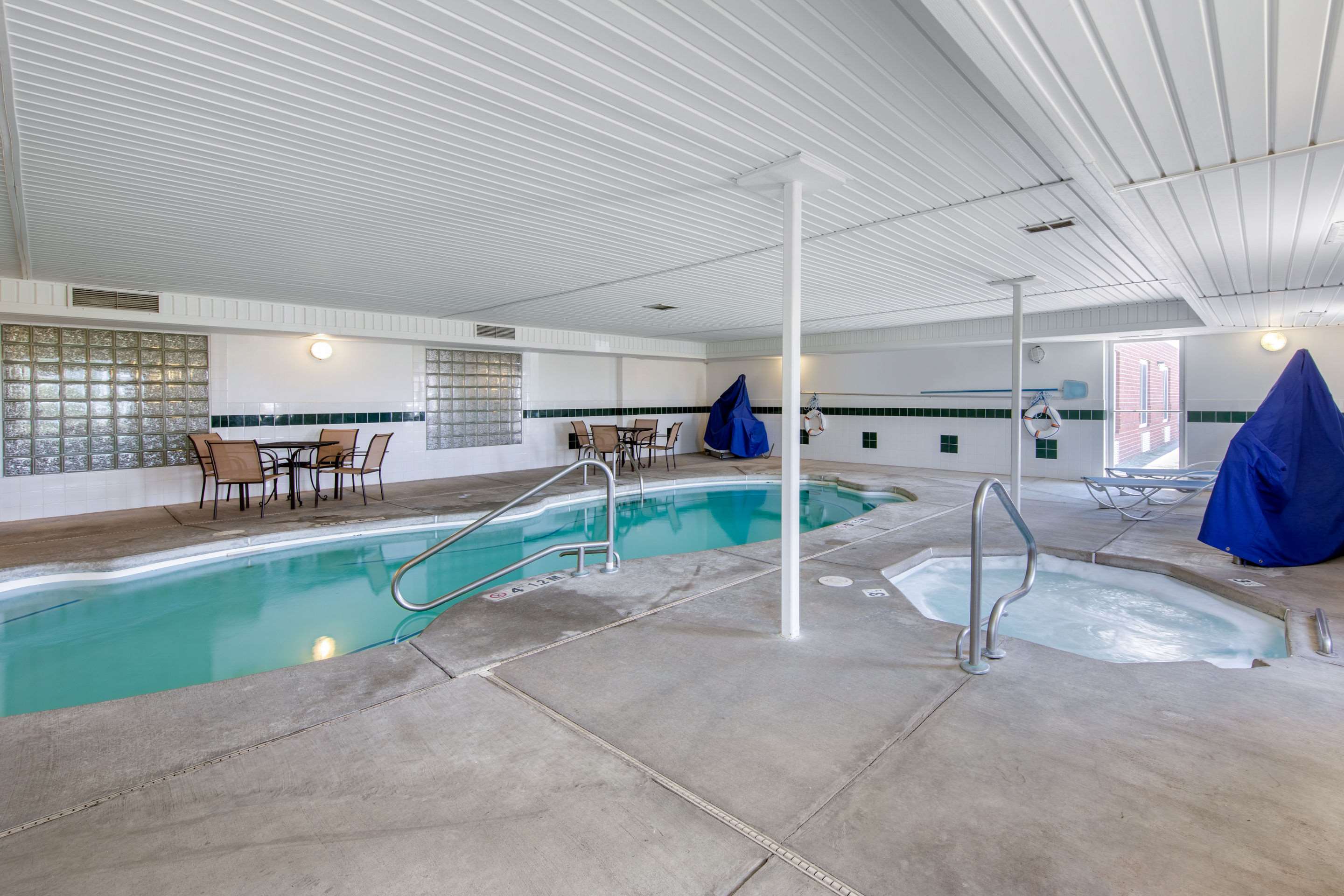 Indoor pool with hot tub | Quality Inn & Suites