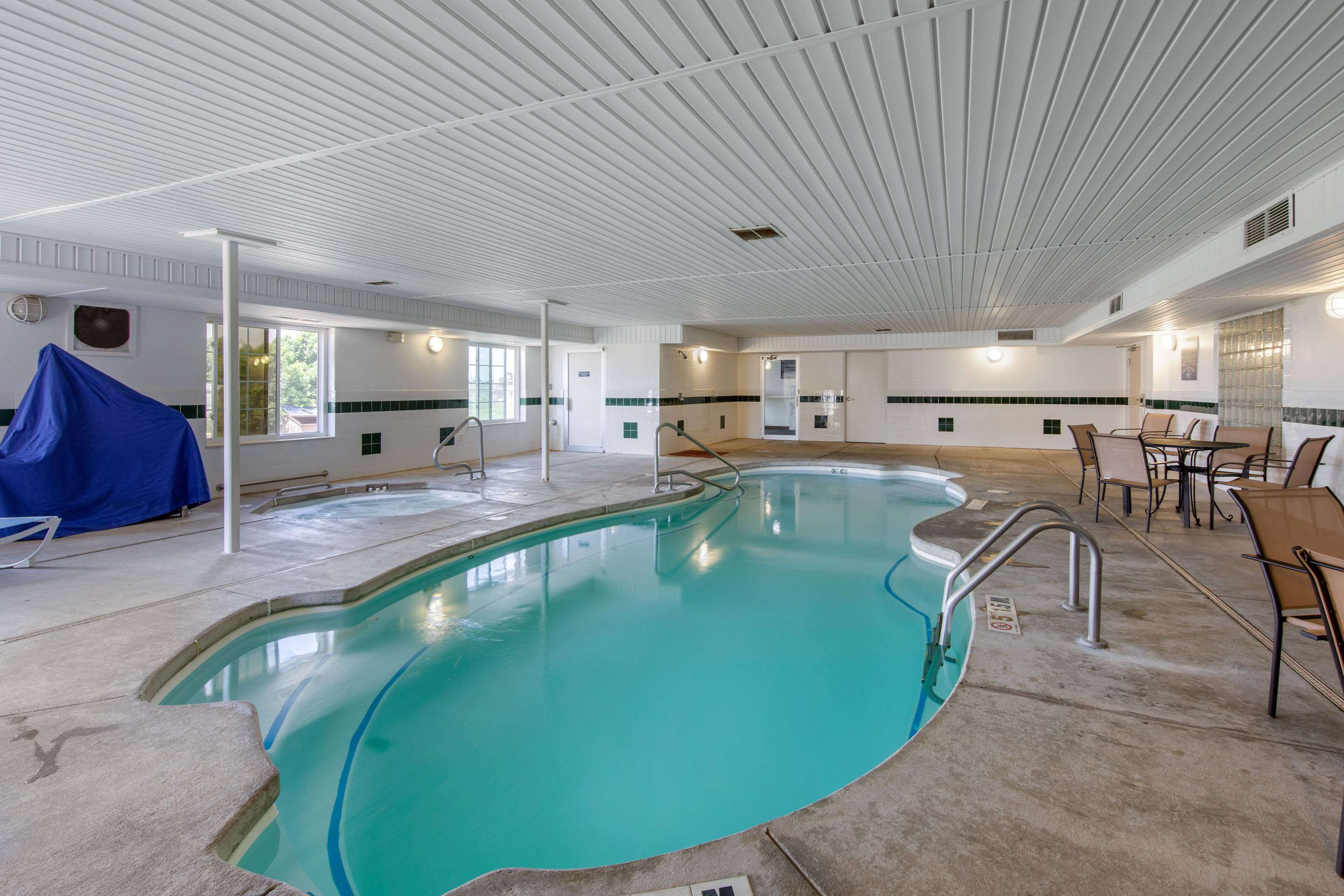 Indoor pool with hot tub | Quality Inn & Suites