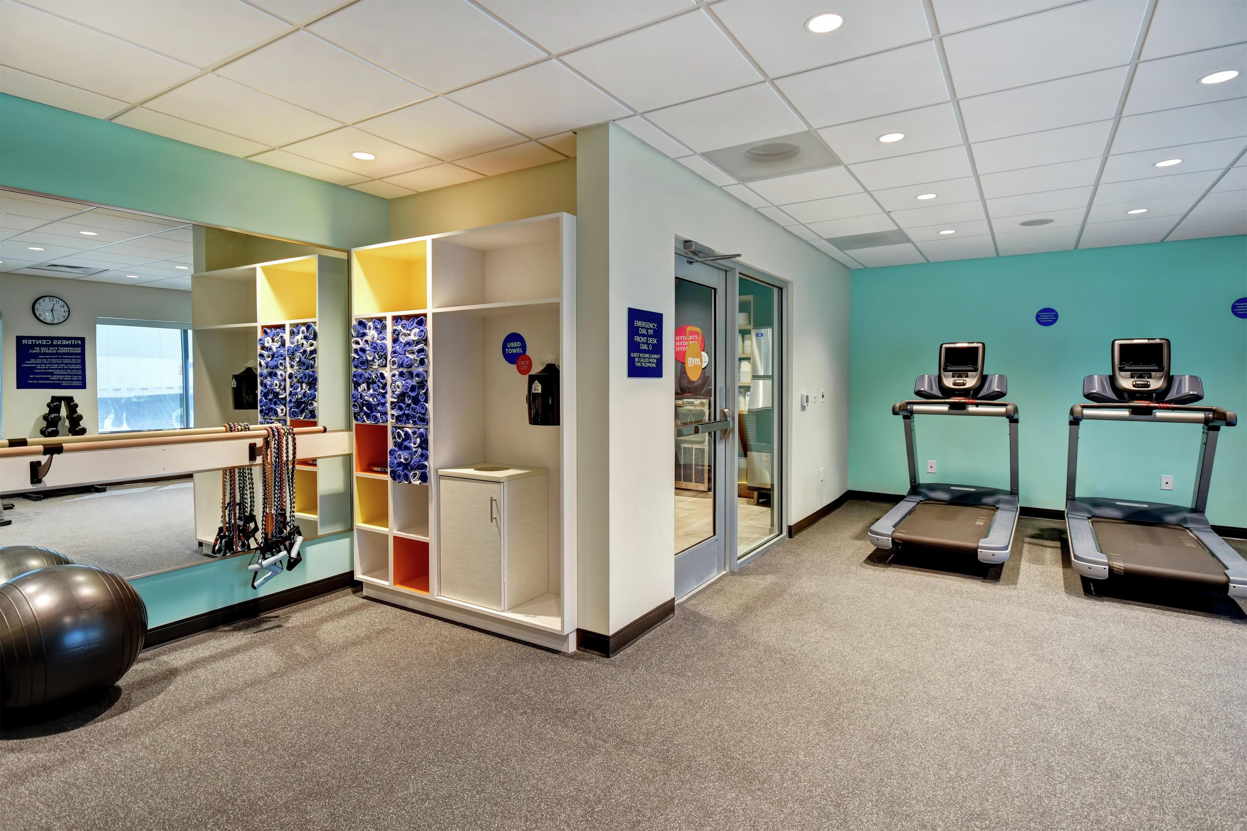 Health club fitness center gym | Tru by Hilton Raleigh Durham Airport