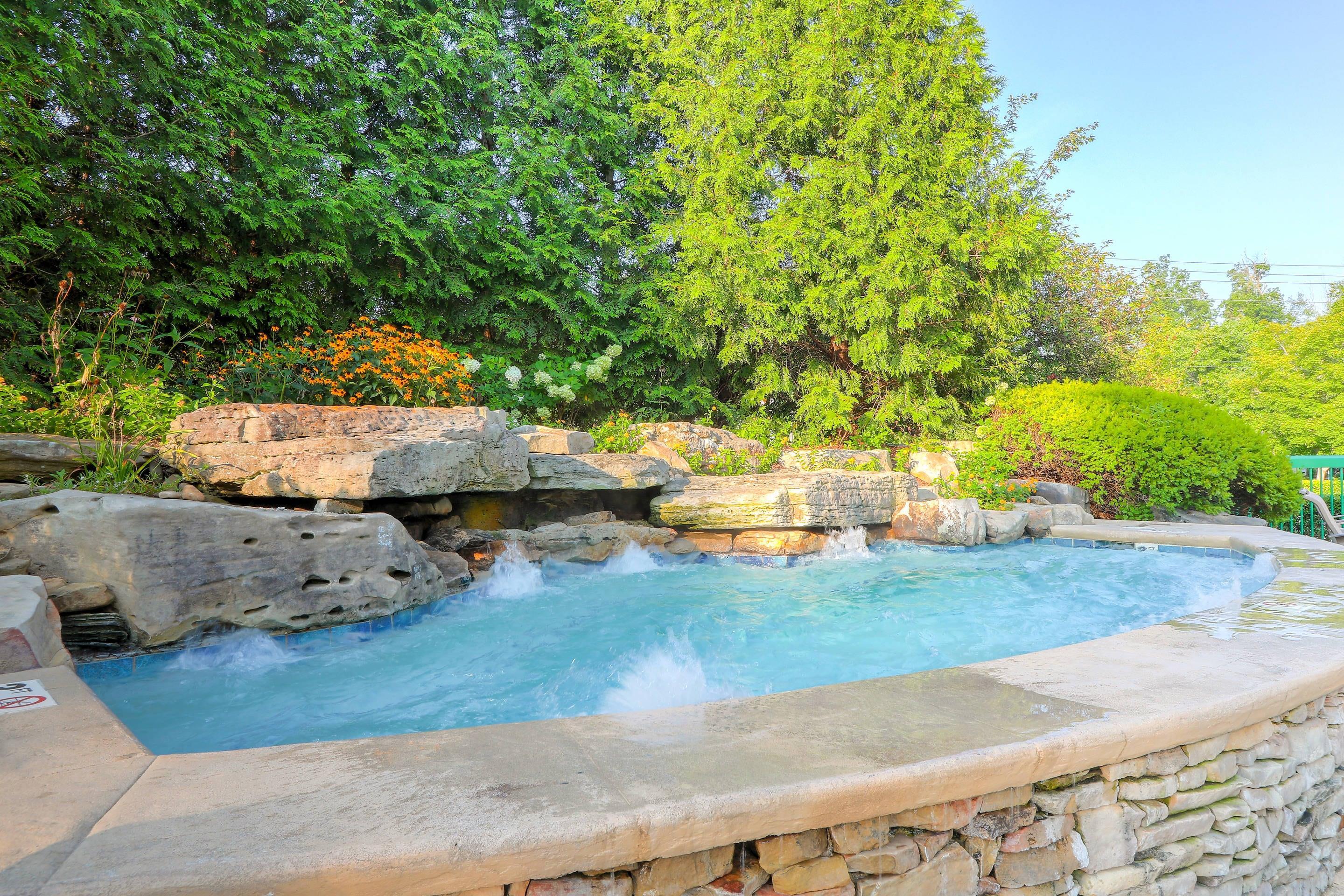 Outdoor pool | Quality Inn Near the Island Pigeon Forge