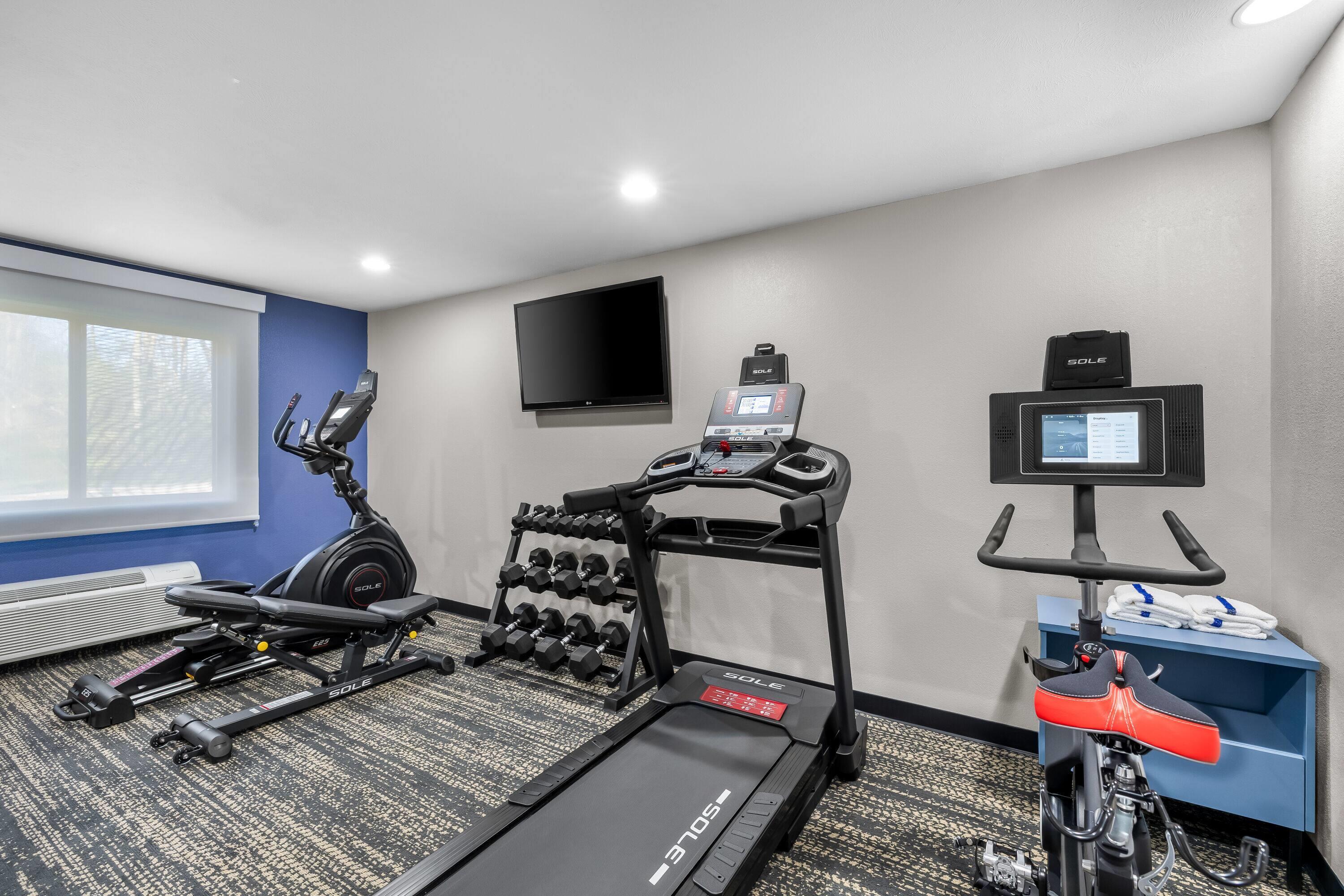 Health club fitness center gym | AmericInn by Wyndham Delafield