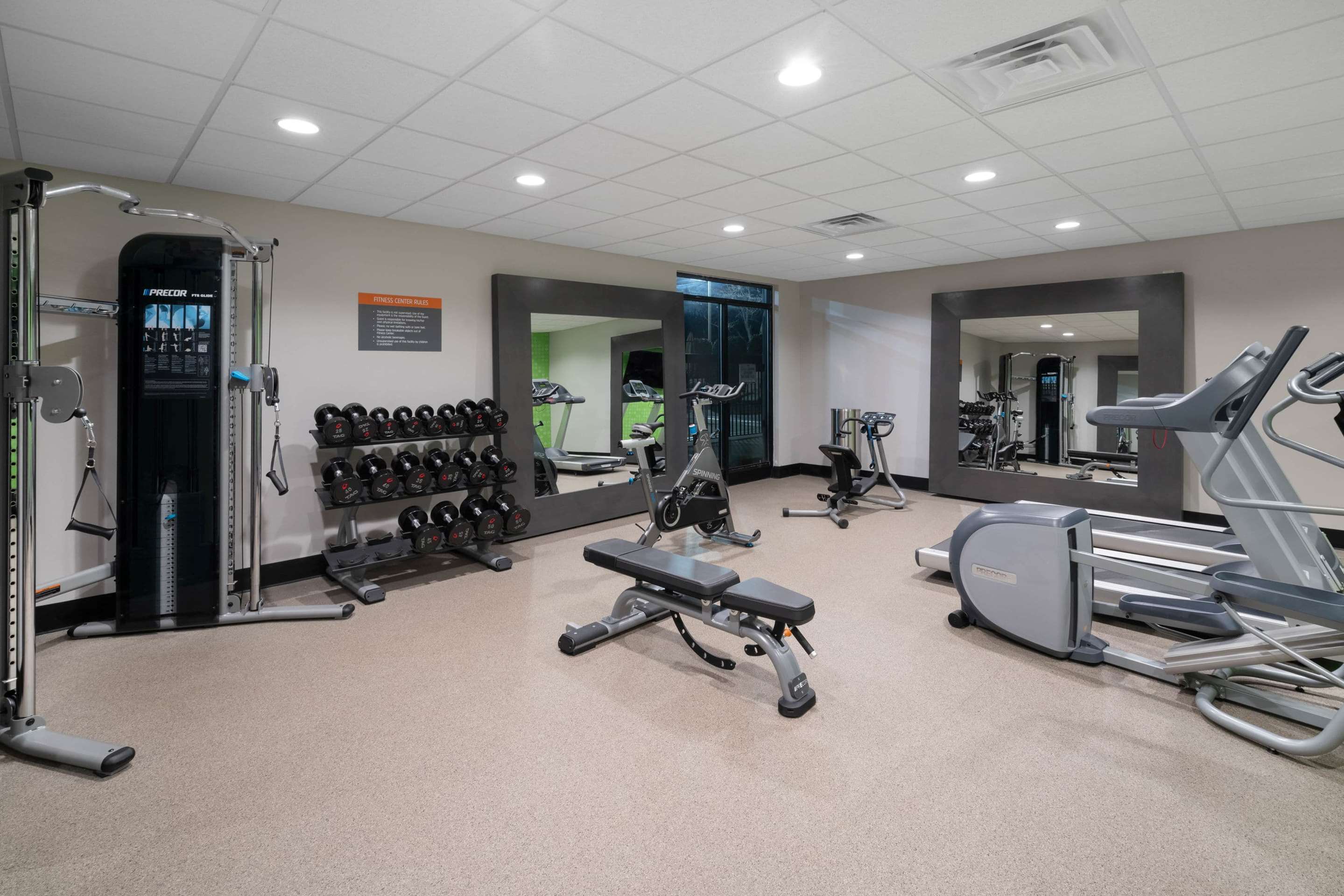 Health club fitness center gym | La Quinta Inn & Suites by Wyndham Raleigh Downtown North