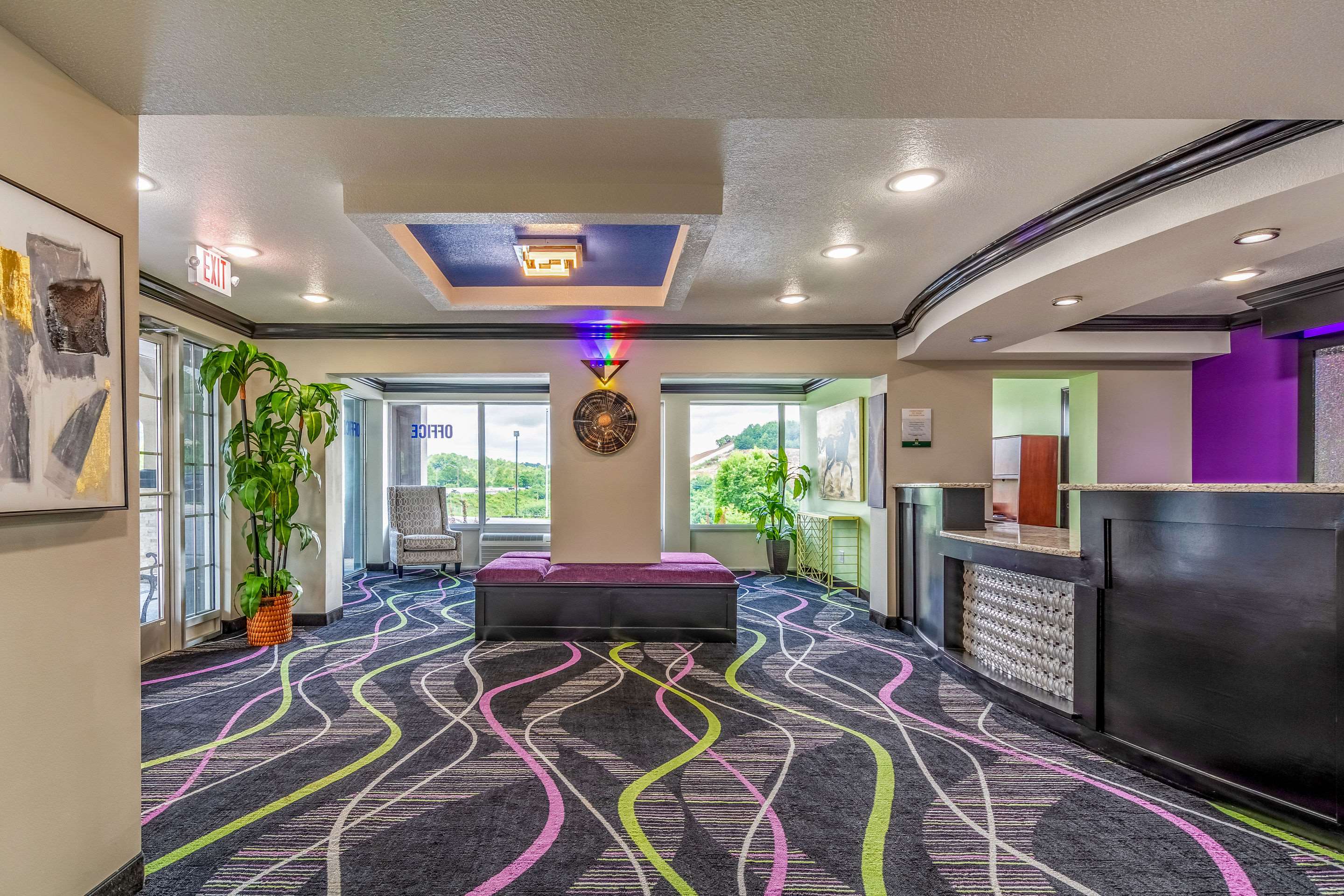 Spacious lobby with sitting area | Quality Inn