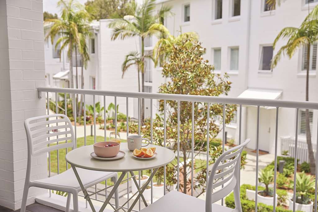 Adina Sydney Chippendale-guestroom-Dining,Guest Room,Sitting area,Suite,On-Site,View from balcony,Family.jpg