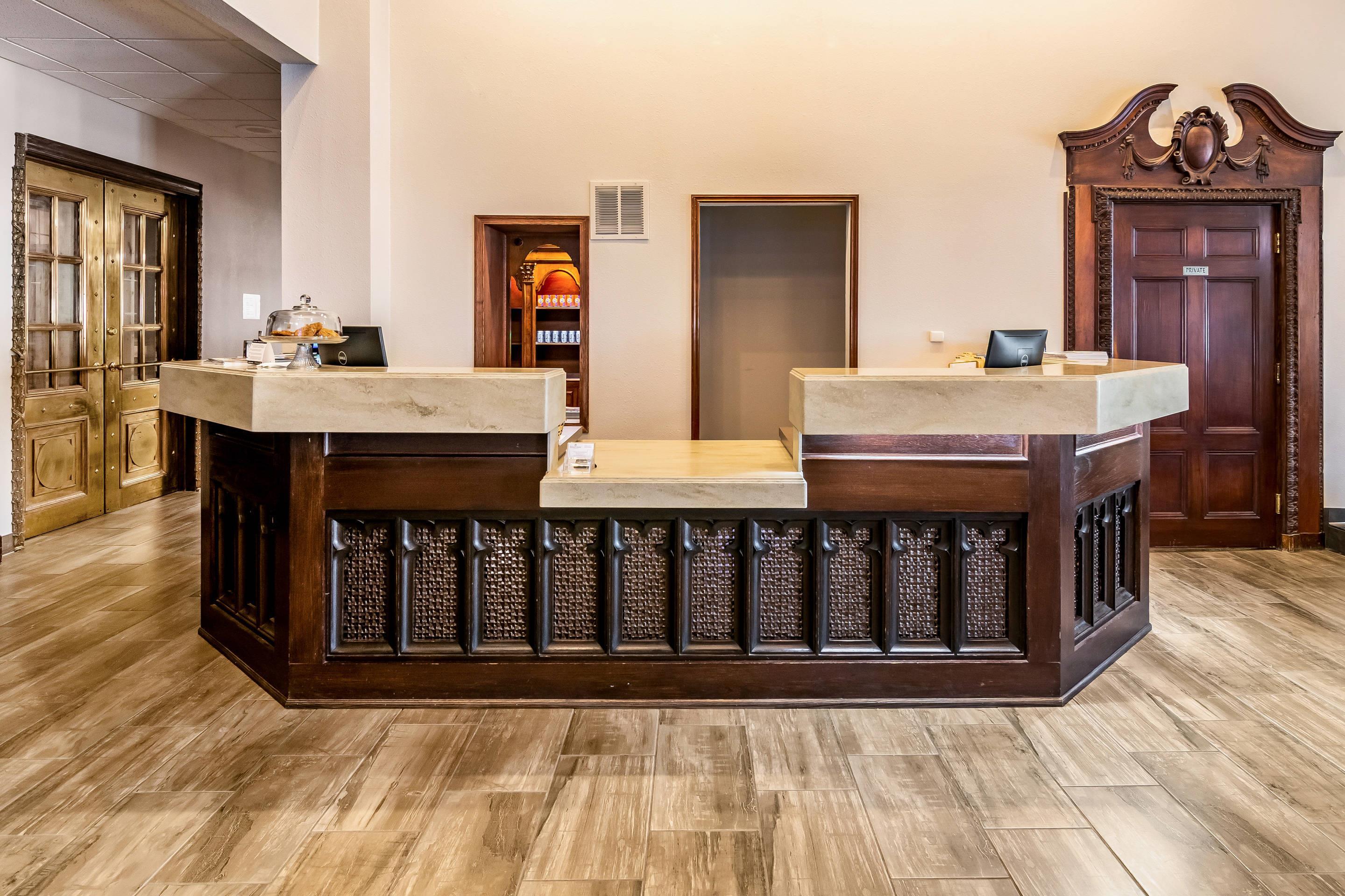 Front desk with friendly staff | Riverview Inn & Suites, Ascend Hotel Collection