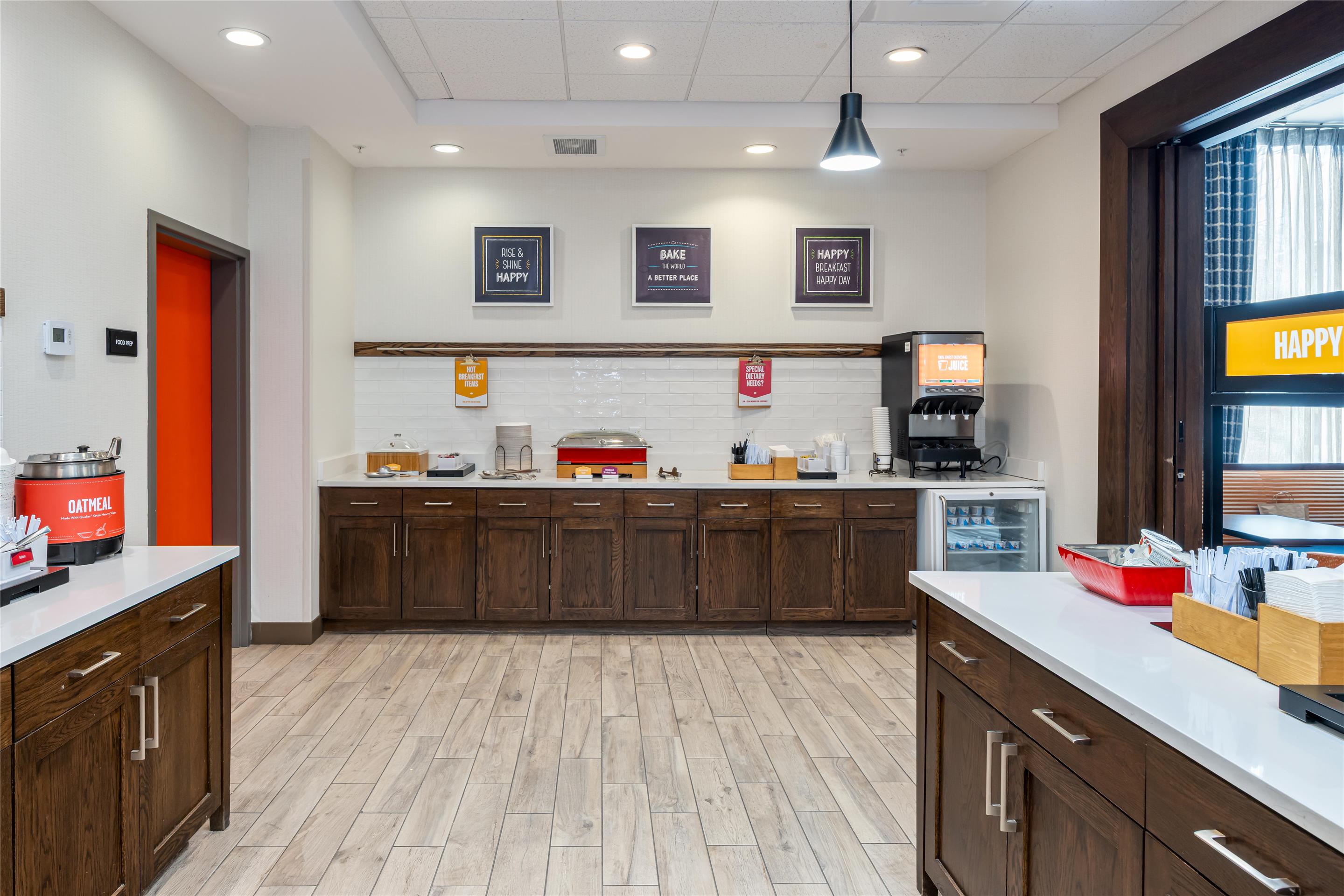 Breakfast Area | Hampton Inn & Suites Logan