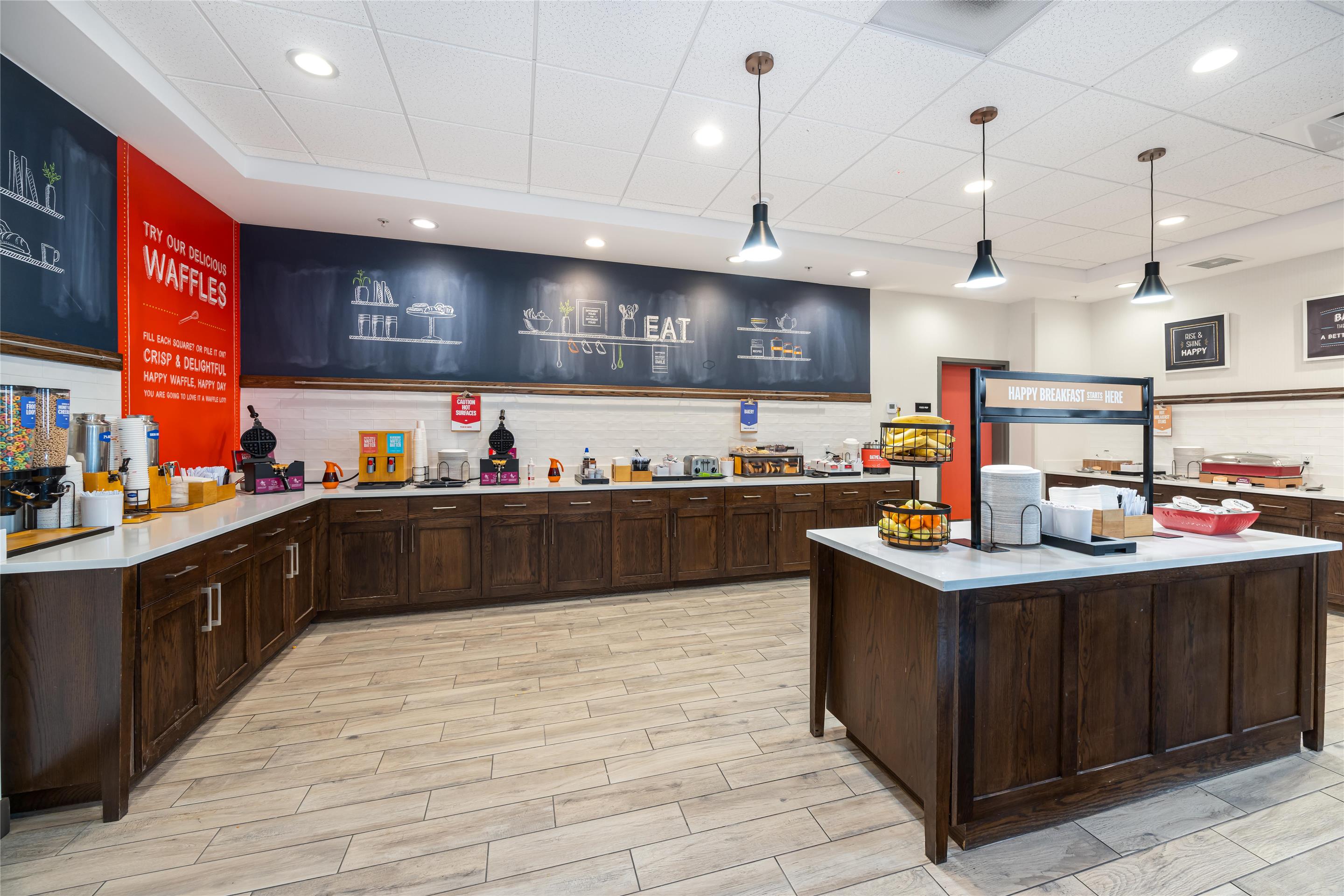 Breakfast Area | Hampton Inn & Suites Logan