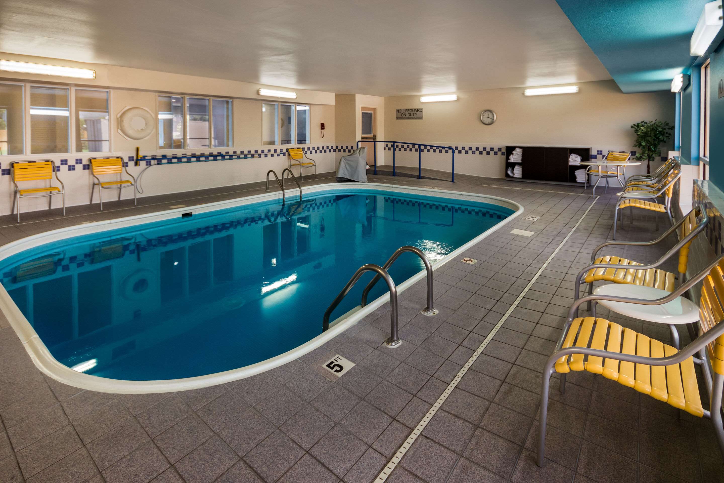 Relax by the pool | Quality Inn & Suites