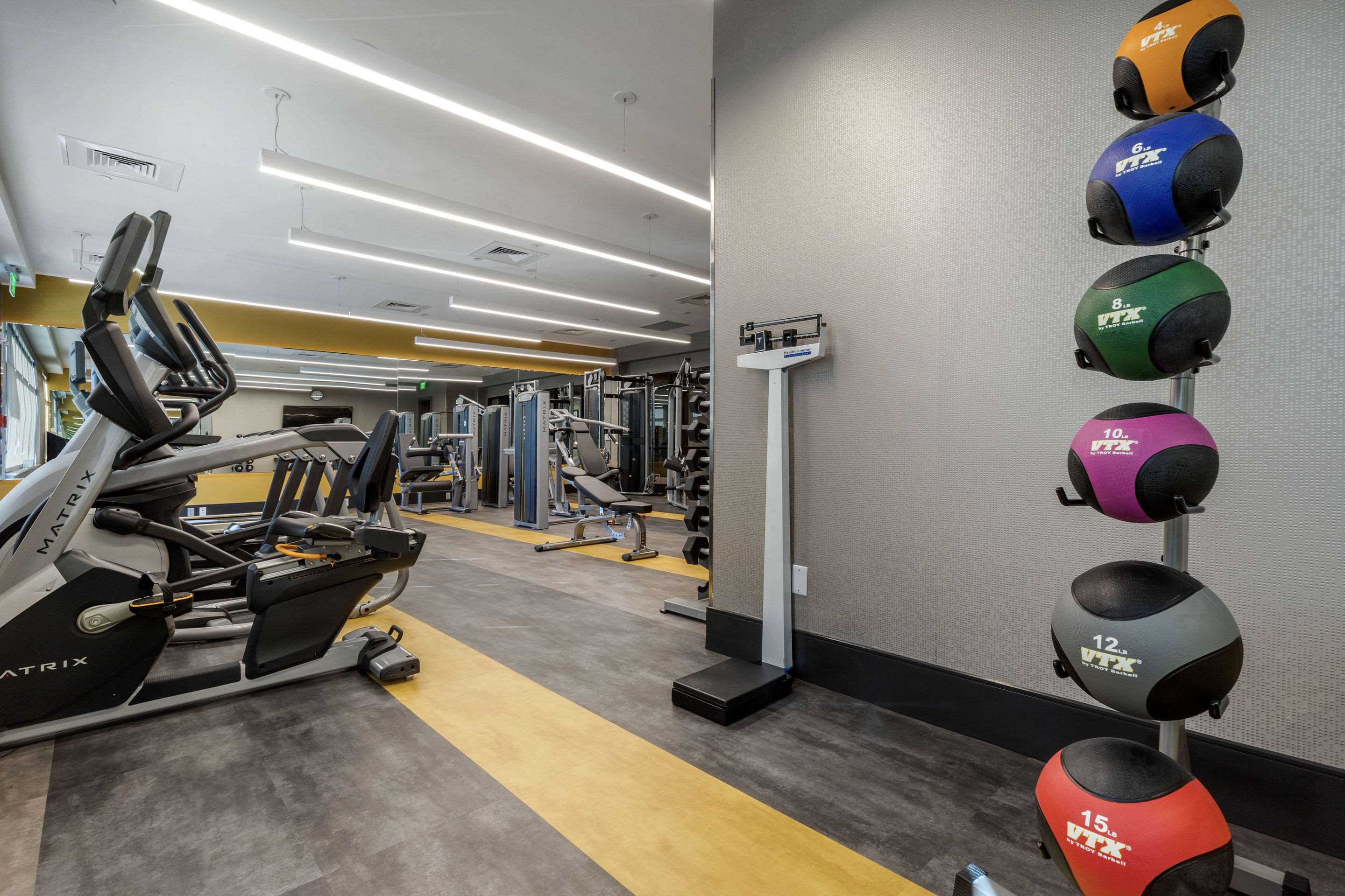 Exercise room with cardio equipment and weights | Cambria Hotel Arundel Mills - BWI Airport