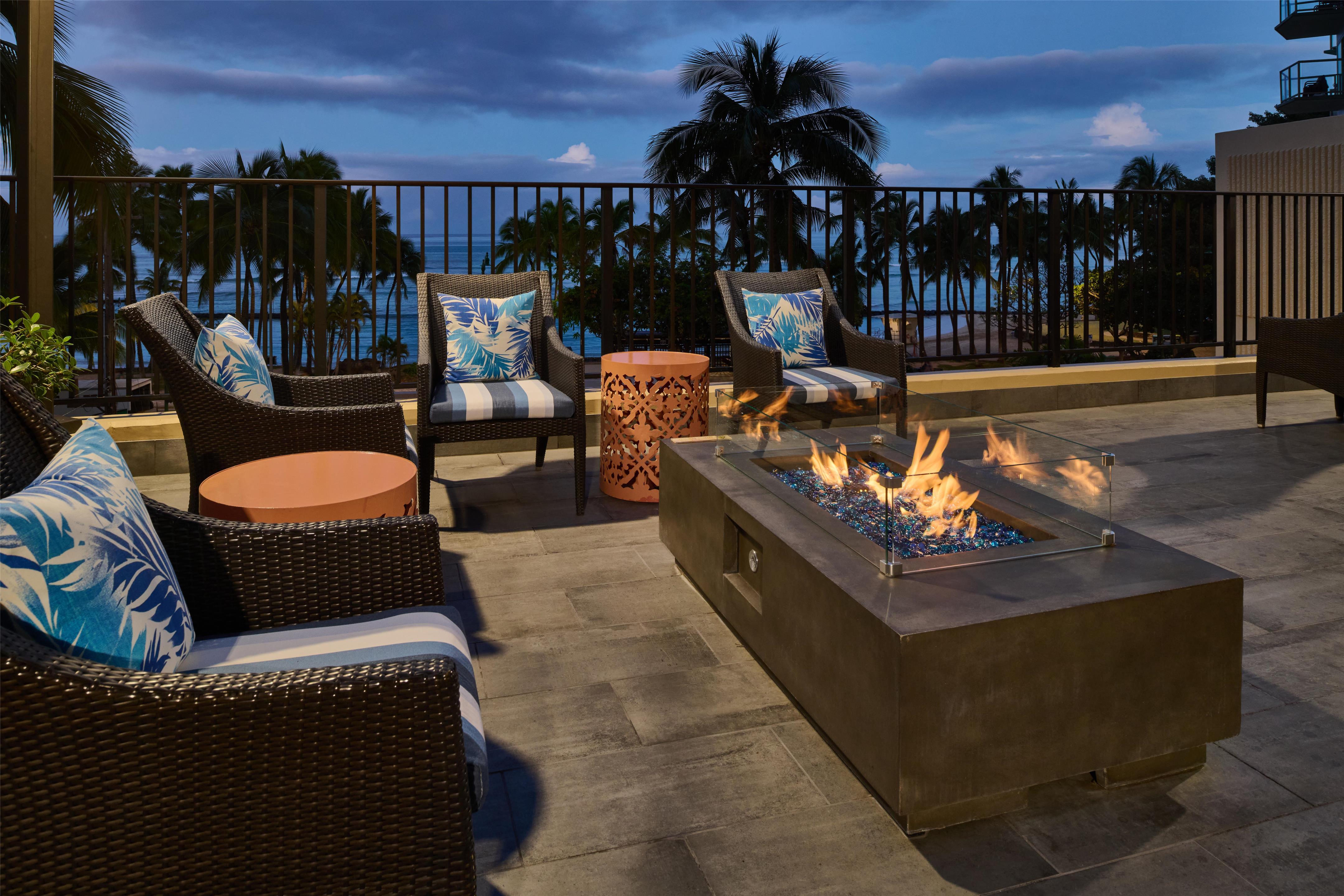 Aston Waikiki Beach Tower - 4th Floor Deck Firepit Seating Area | Aston Waikiki Beach Hotel
