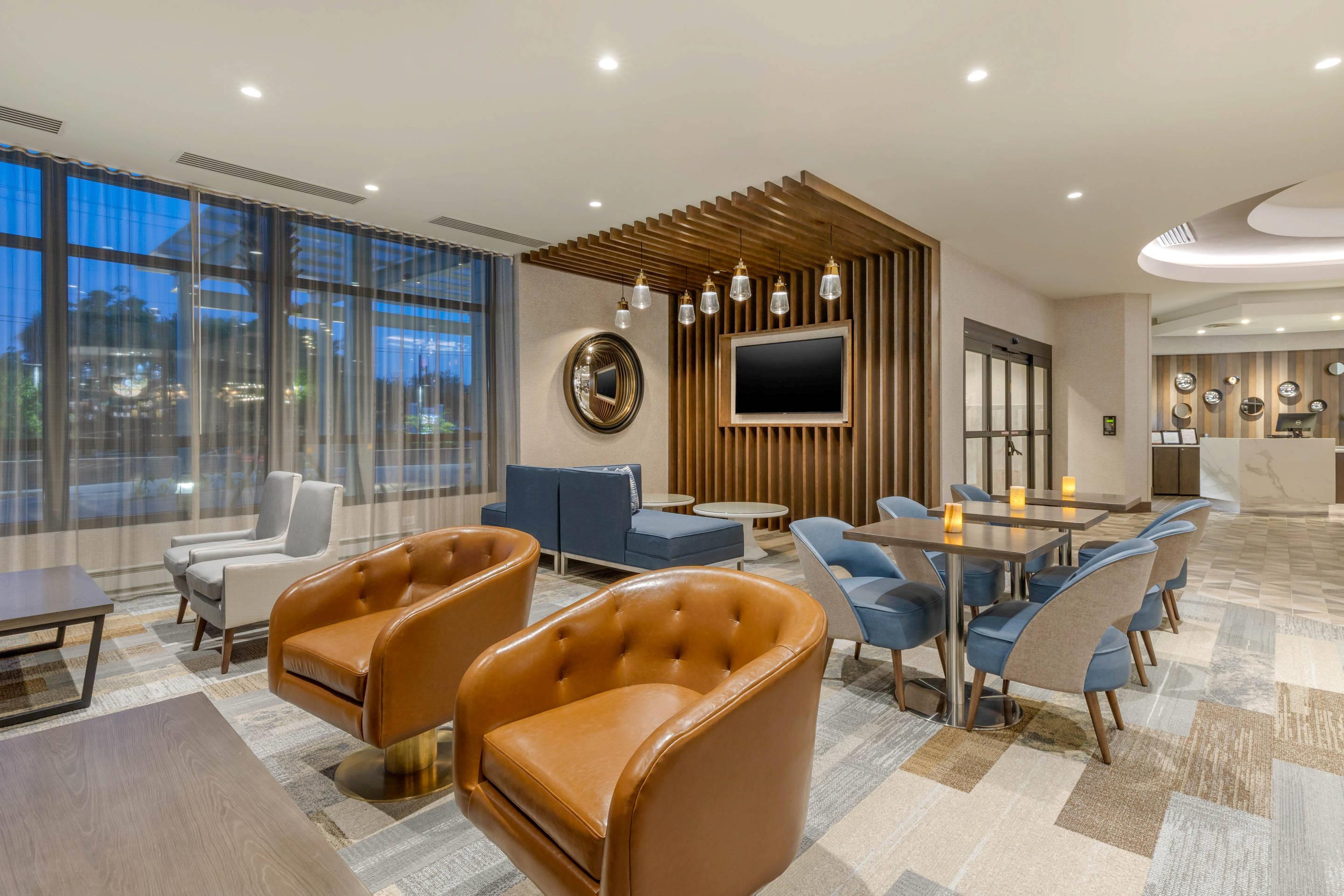 Lobby with sitting area | Cambria Hotel Charleston Riverview