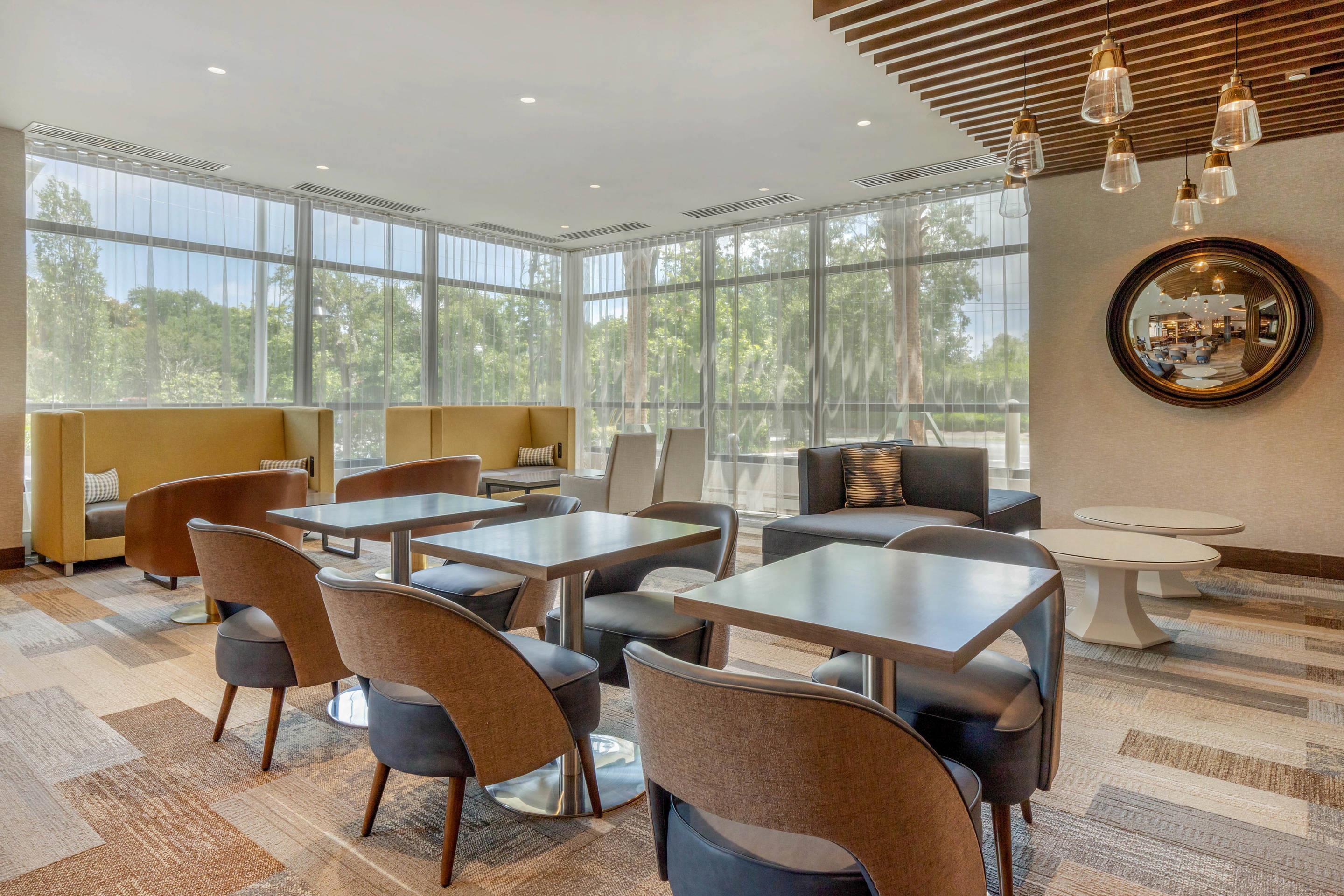 Enjoy breakfast in this seating area | Cambria Hotel Charleston Riverview