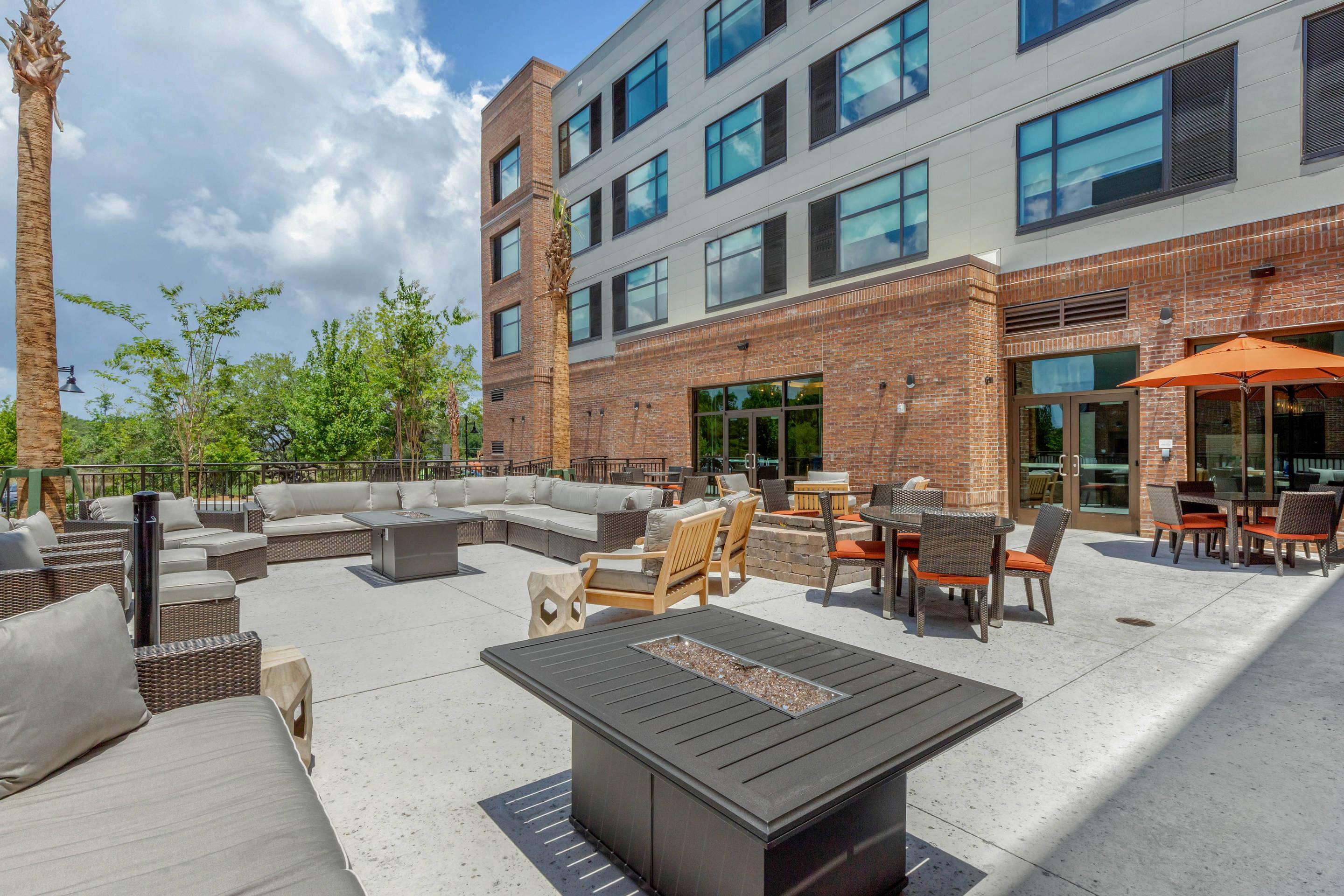 Relax on the sundeck | Cambria Hotel Charleston Riverview