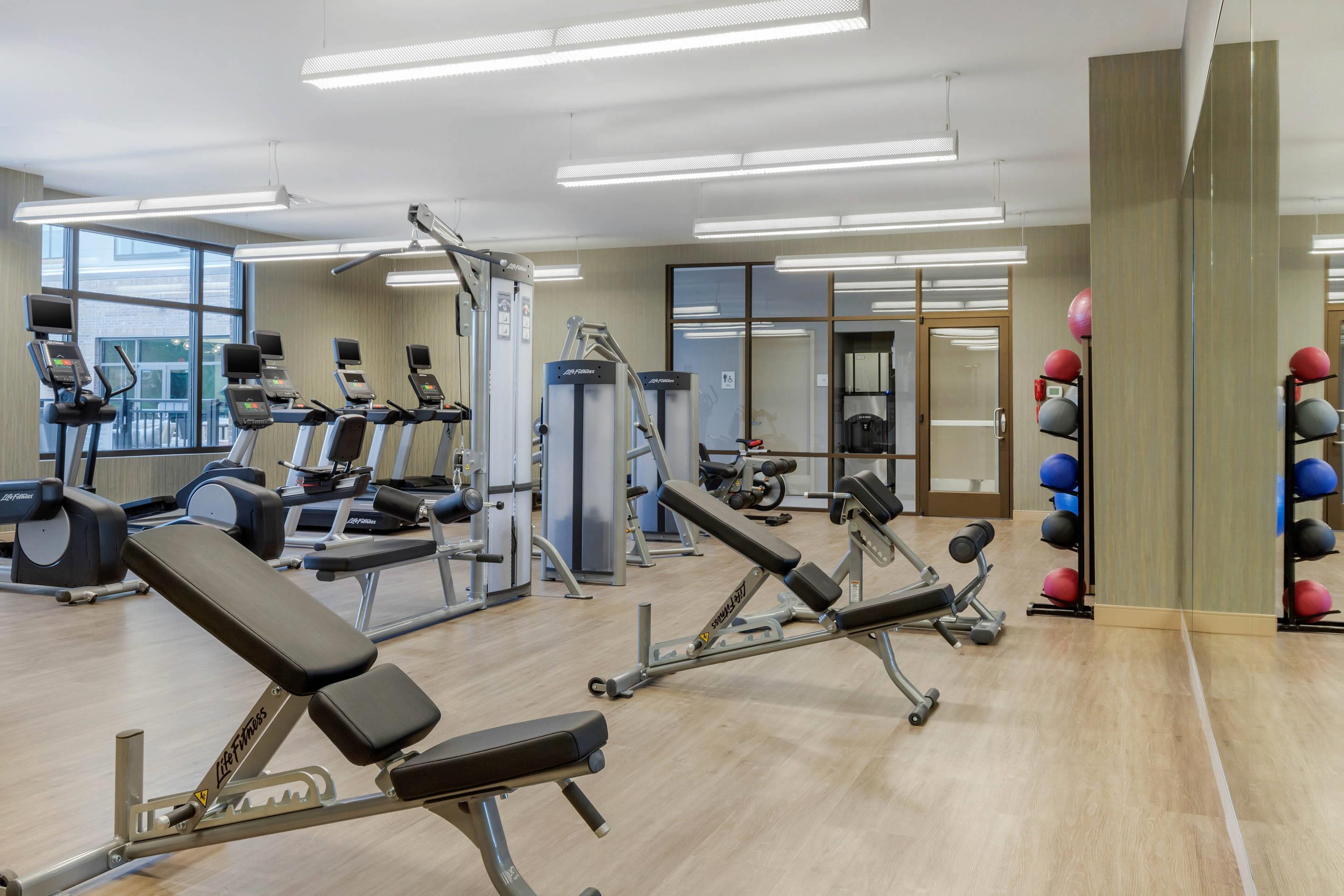 Exercise room with cardio equipment | Cambria Hotel Charleston Riverview