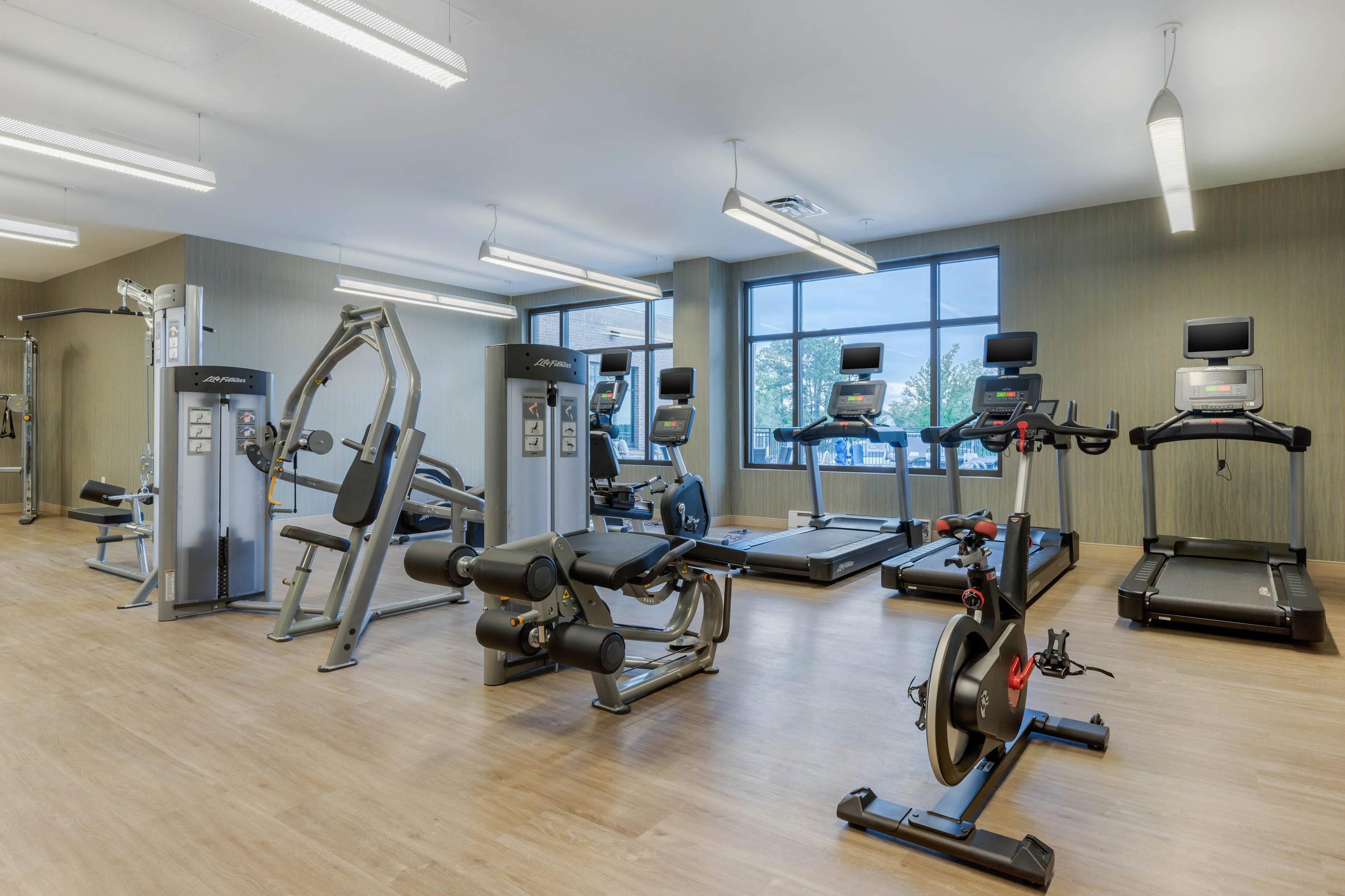 Exercise room with cardio equipment | Cambria Hotel Charleston Riverview