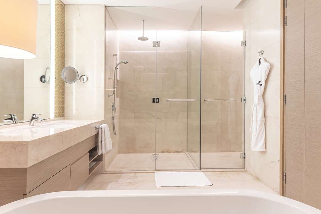 RADISSON COLLECTION MUSCAT, HORMUZ-guestroom-Guest Room,Bathroom,Suite,On-Site.jpg
