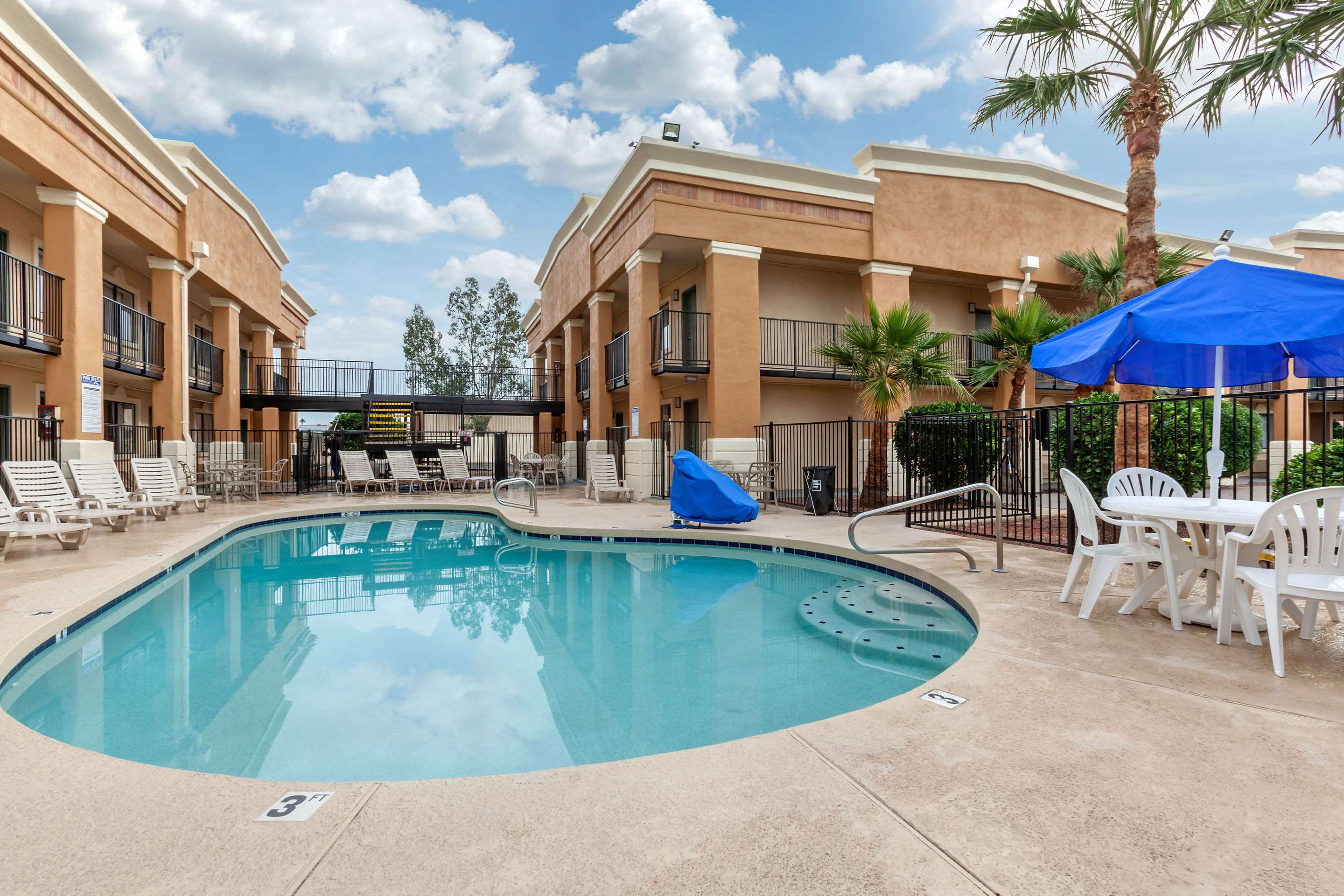 Outdoor pool | Quality Inn & Suites near Downtown Mesa
