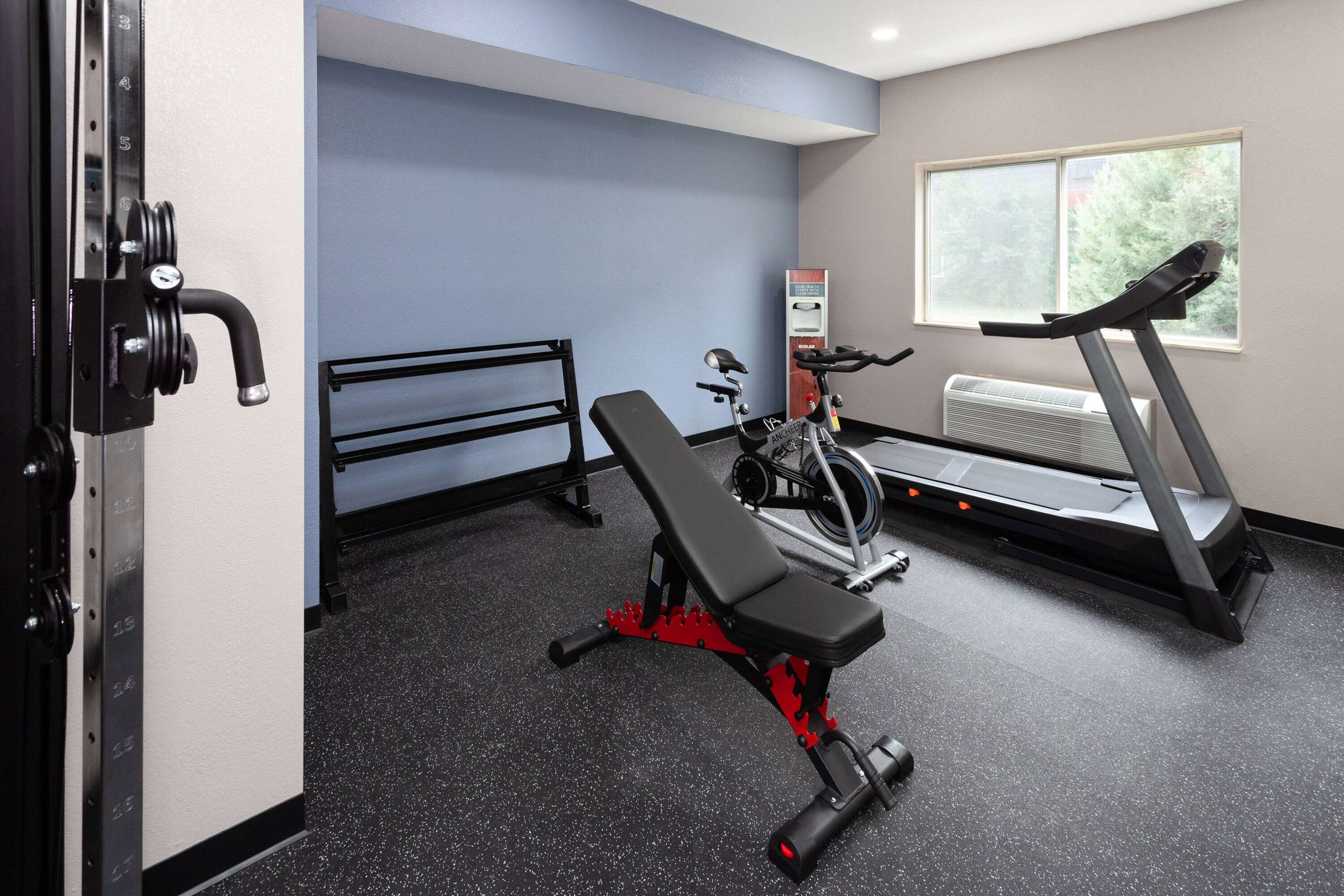 Health club fitness center gym | AmericInn by Wyndham Hudson