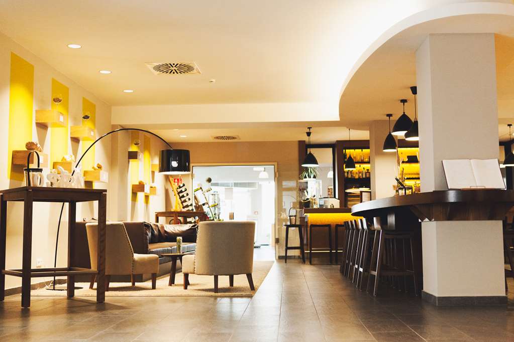 Weinhotel Kaisergarten-guestroom-Dining,Dining Area,Architecture,Indoor/Interior,Summer,View from room,Exterior View of Building.jpg