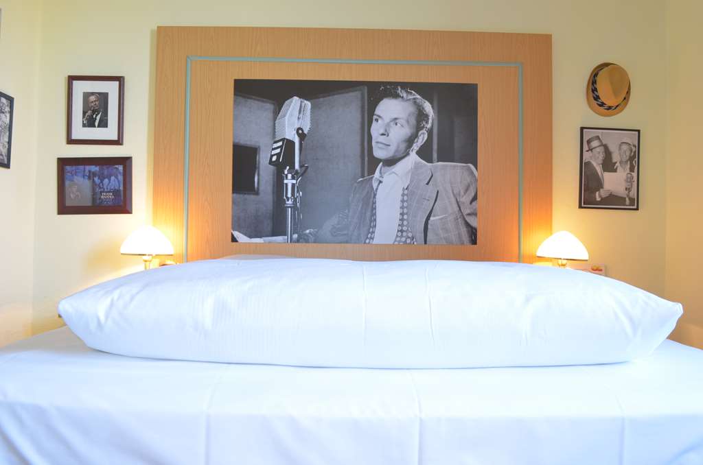 Retro-Art-Hotel Luenen-guestroom-Guest Room,Bed,Bedding,Guest Room Amenity,Living Area,Indoor/Interior,On-Site,People,Summer,View from room.jpg
