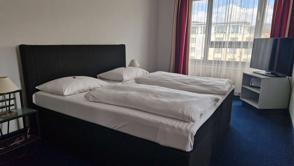 City Hotel Fortuna-guestroom-Guest Room,Suite,On-Site.jpg