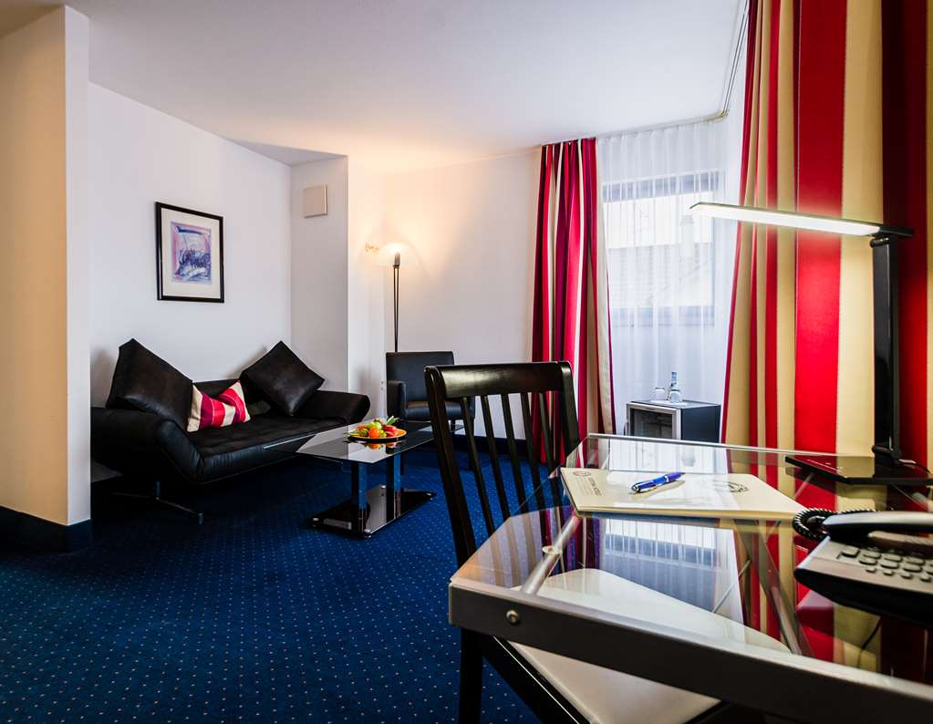 City Hotel Fortuna-guestroom-Guest Room,Living Area,Architecture,Indoor/Interior,On-Site,Décor detail,View from room,Exterior View of Building.jpg