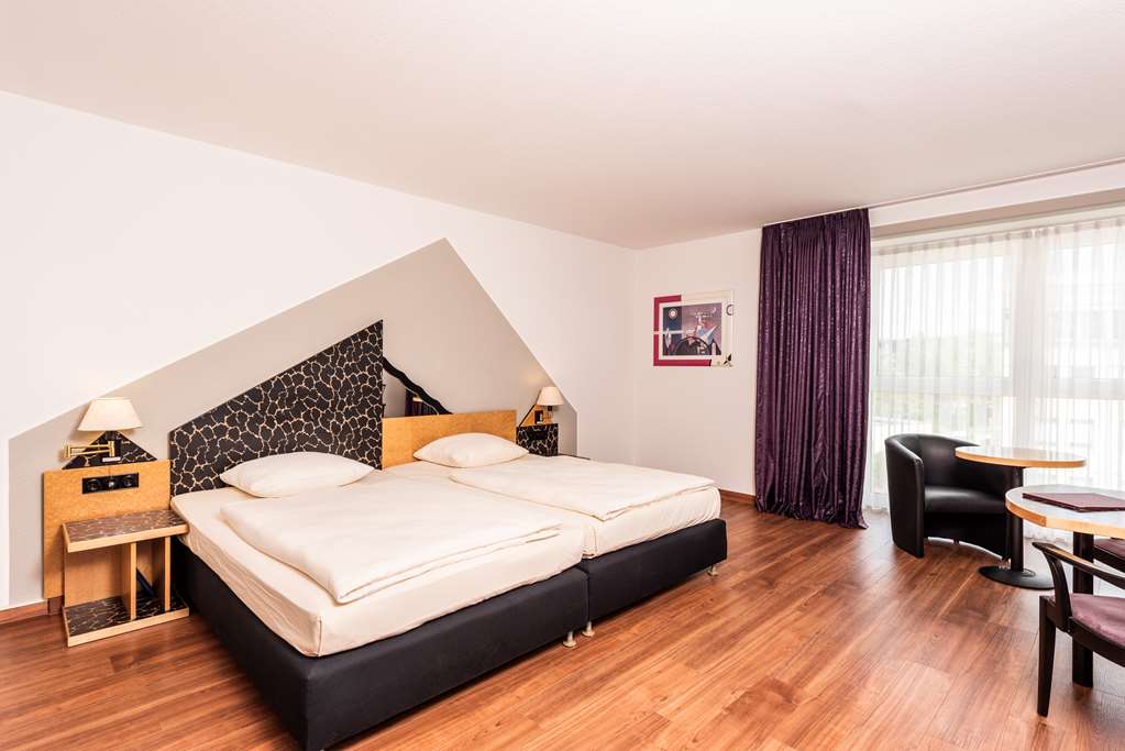ARVENA KONGRESS Hotel-guestroom-Guest Room,Suite,On-Site.jpg