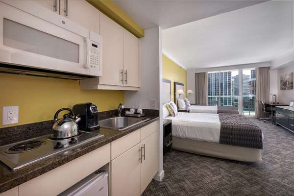 2 Queen Beds, Non-Smoking, City View, Balcony, Flat Screen Television, Microwave And Refrigerator, Kitchenette