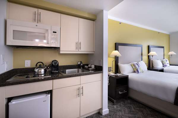 2 Queen Beds, Non-Smoking, City View, Balcony, Flat Screen Television, Microwave And Refrigerator, Kitchenette